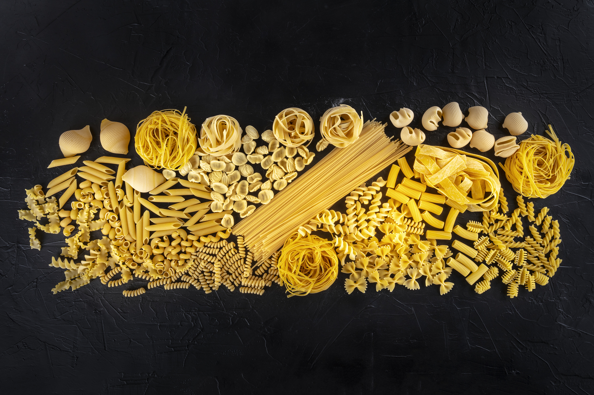 italian pasta texture, a flat lay of a variety of pasta types, s