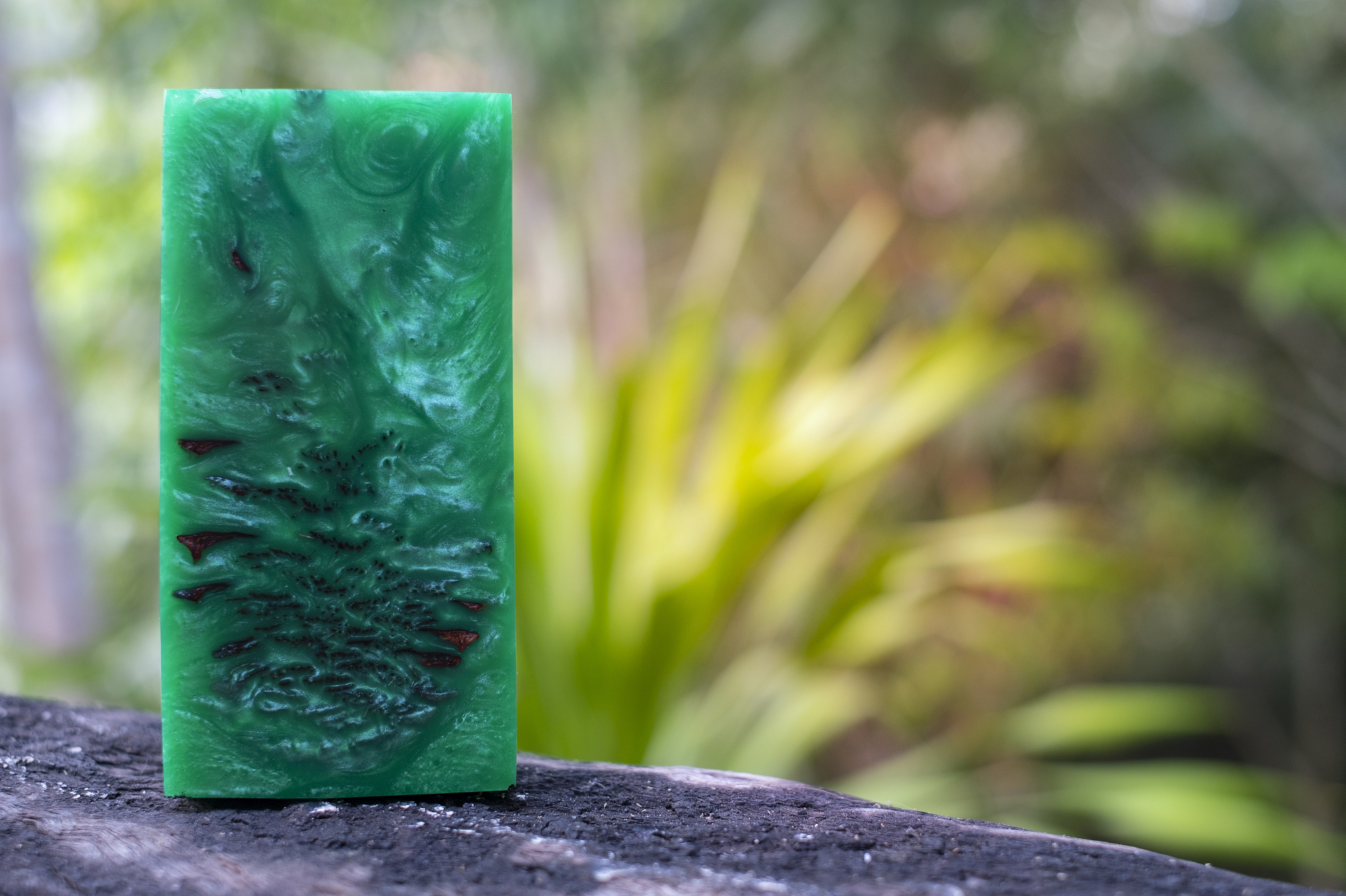 casting epoxy resin stabilizing pine cone abstract art blurred b