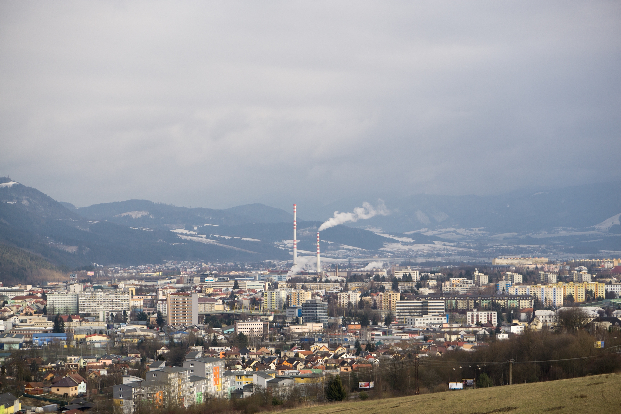 sunrise and sunset over the buildings in the zilina city.