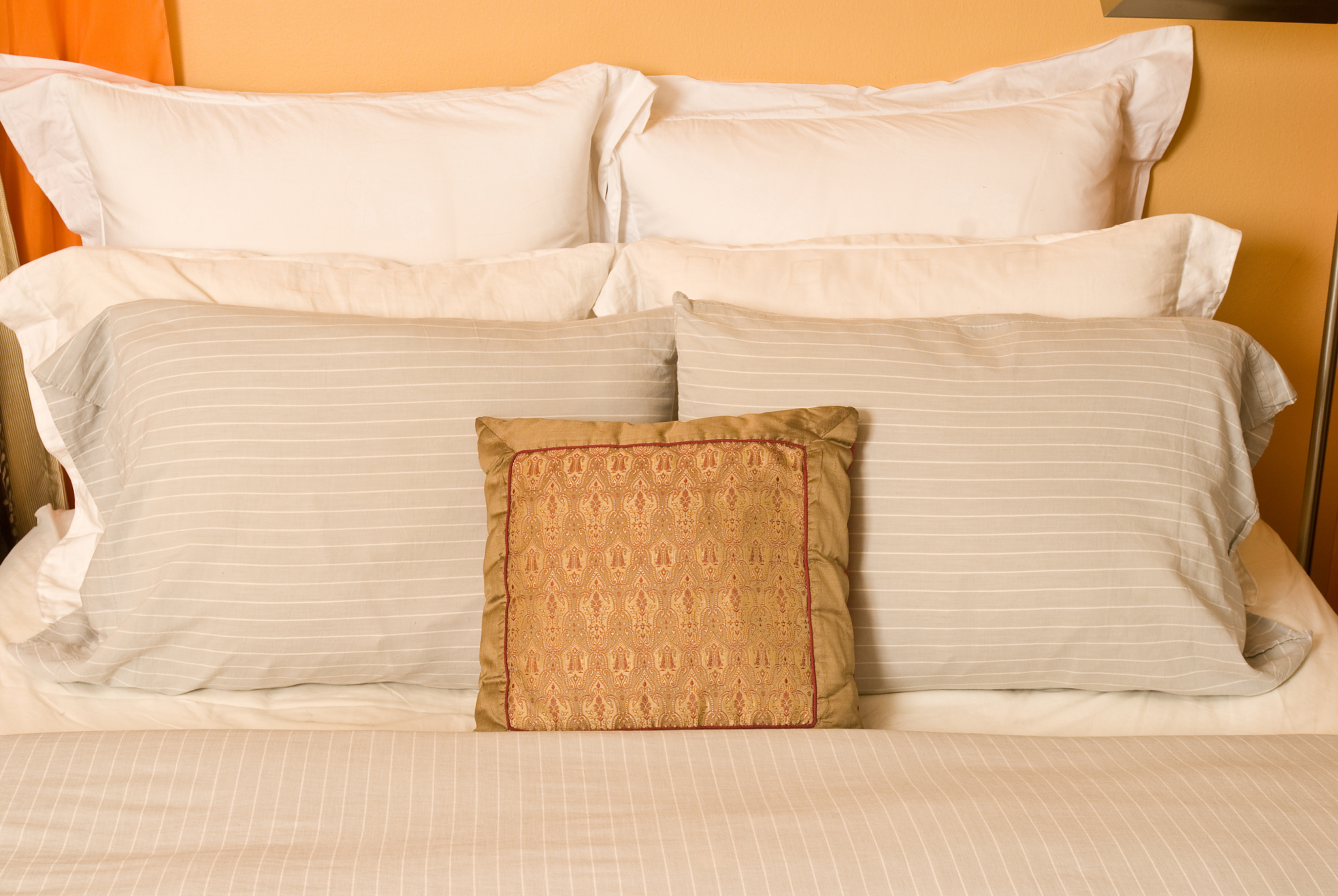 pillows arranged on bed