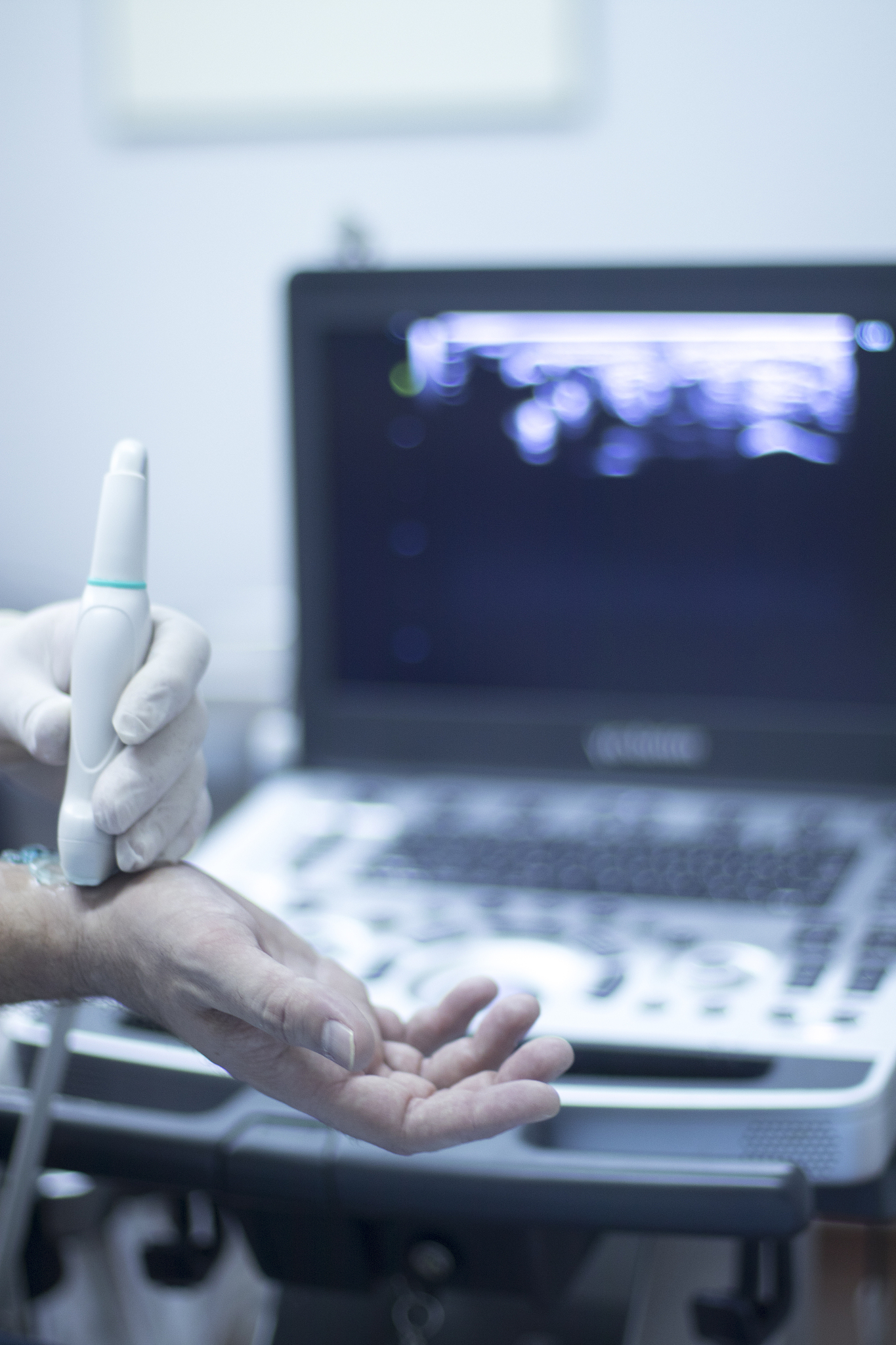cropped hands with medical equipment in hospital