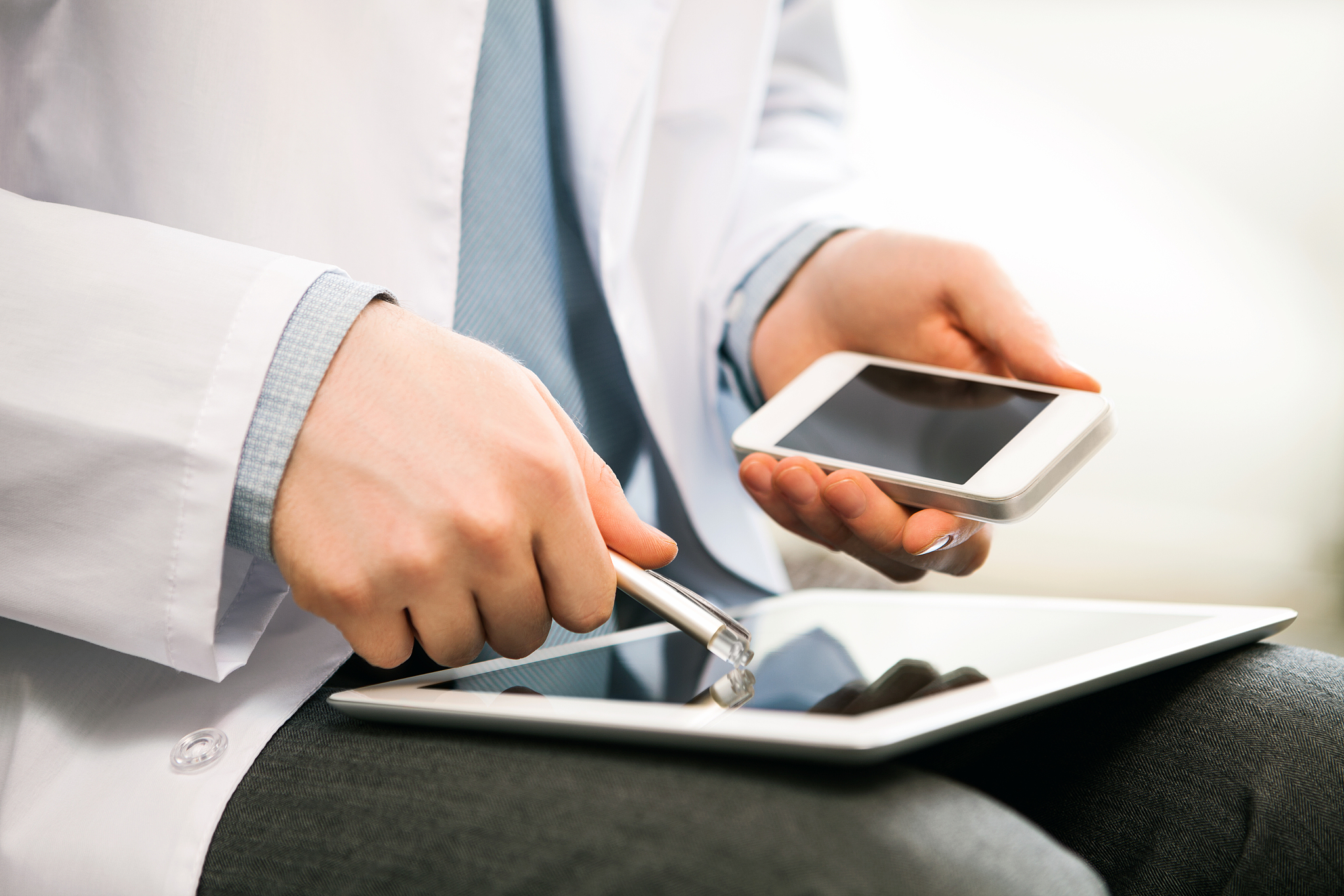 doctor uses gadgets