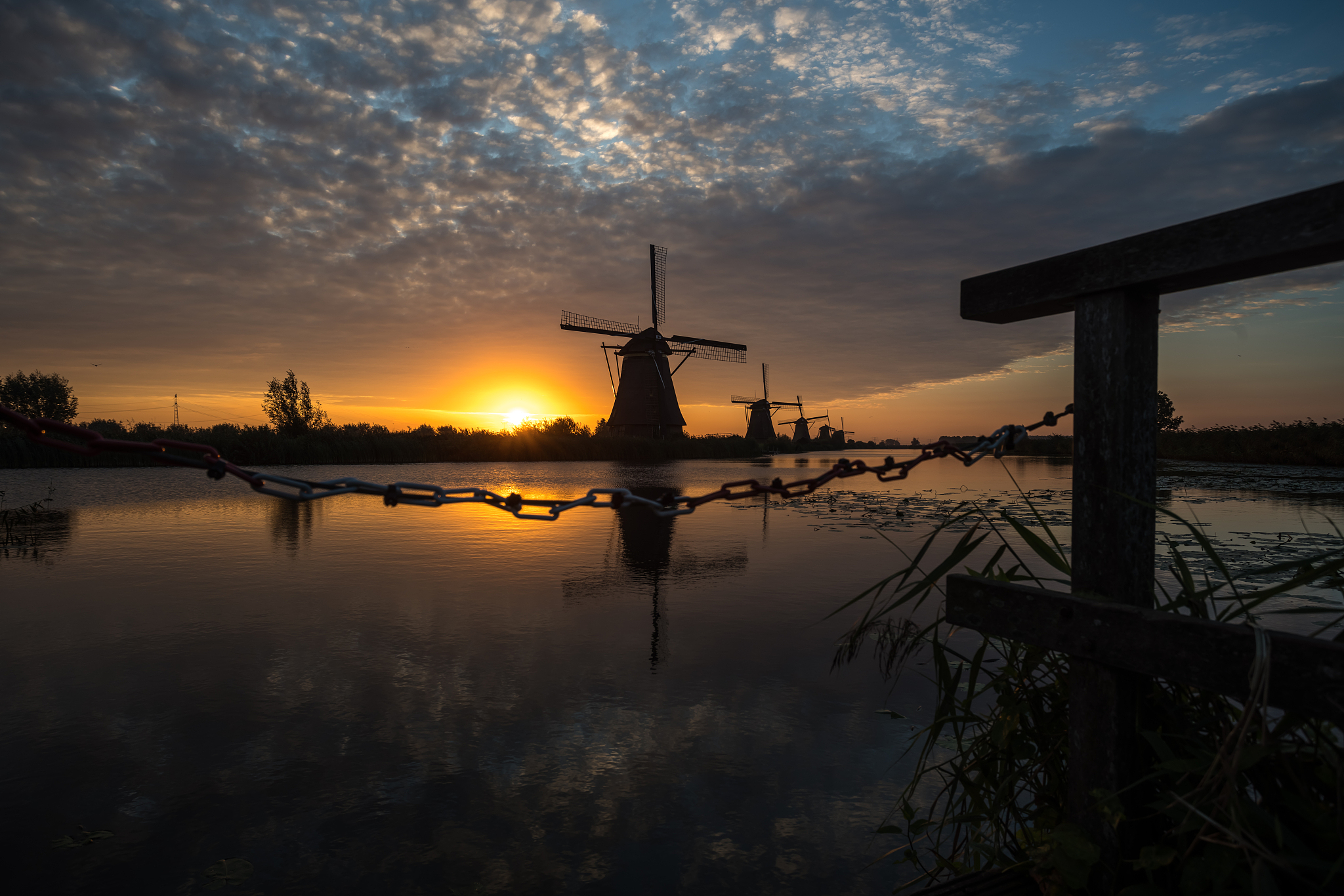 kinderdijk in holland by sunrise