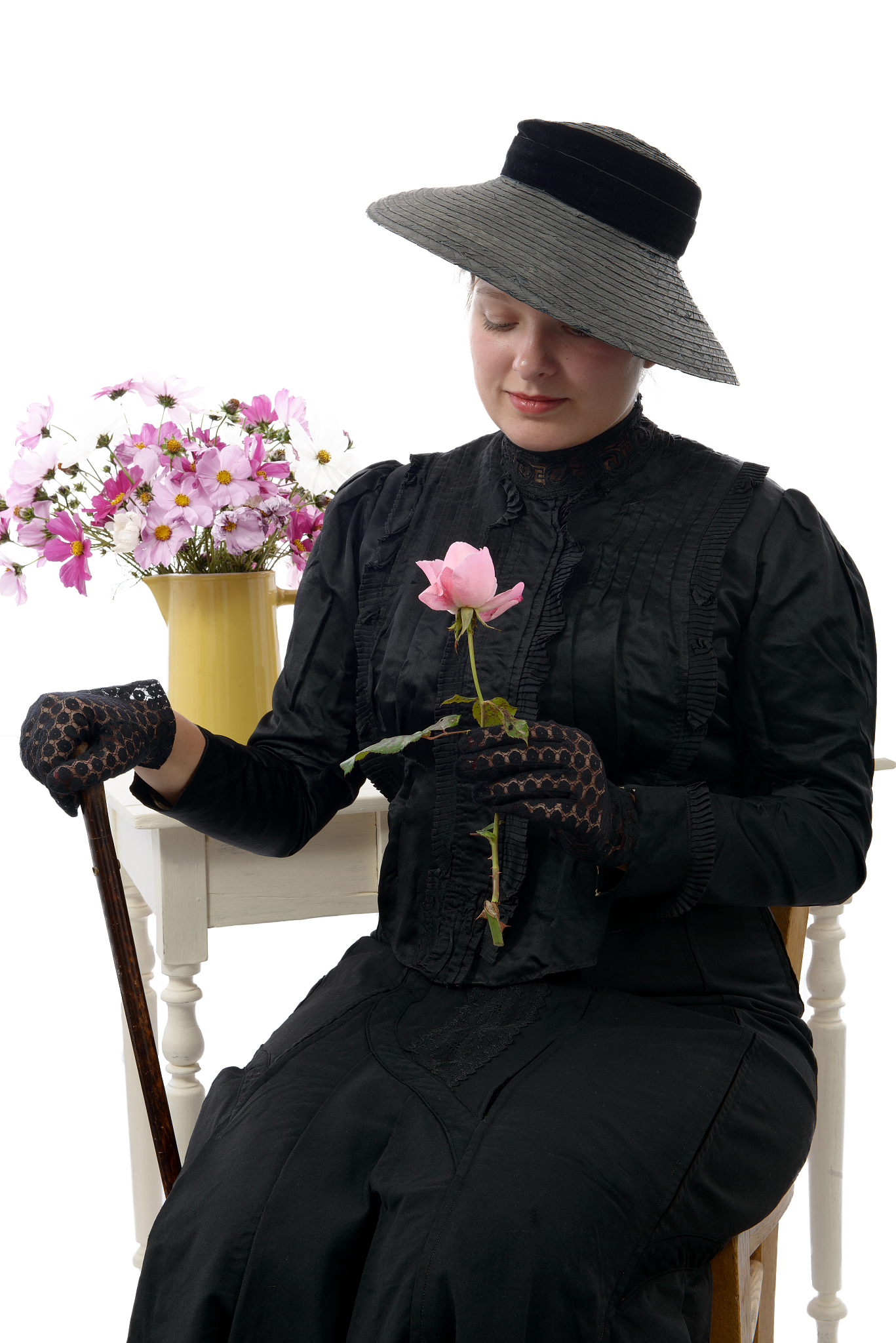 a young woman in vintage costume 1900s