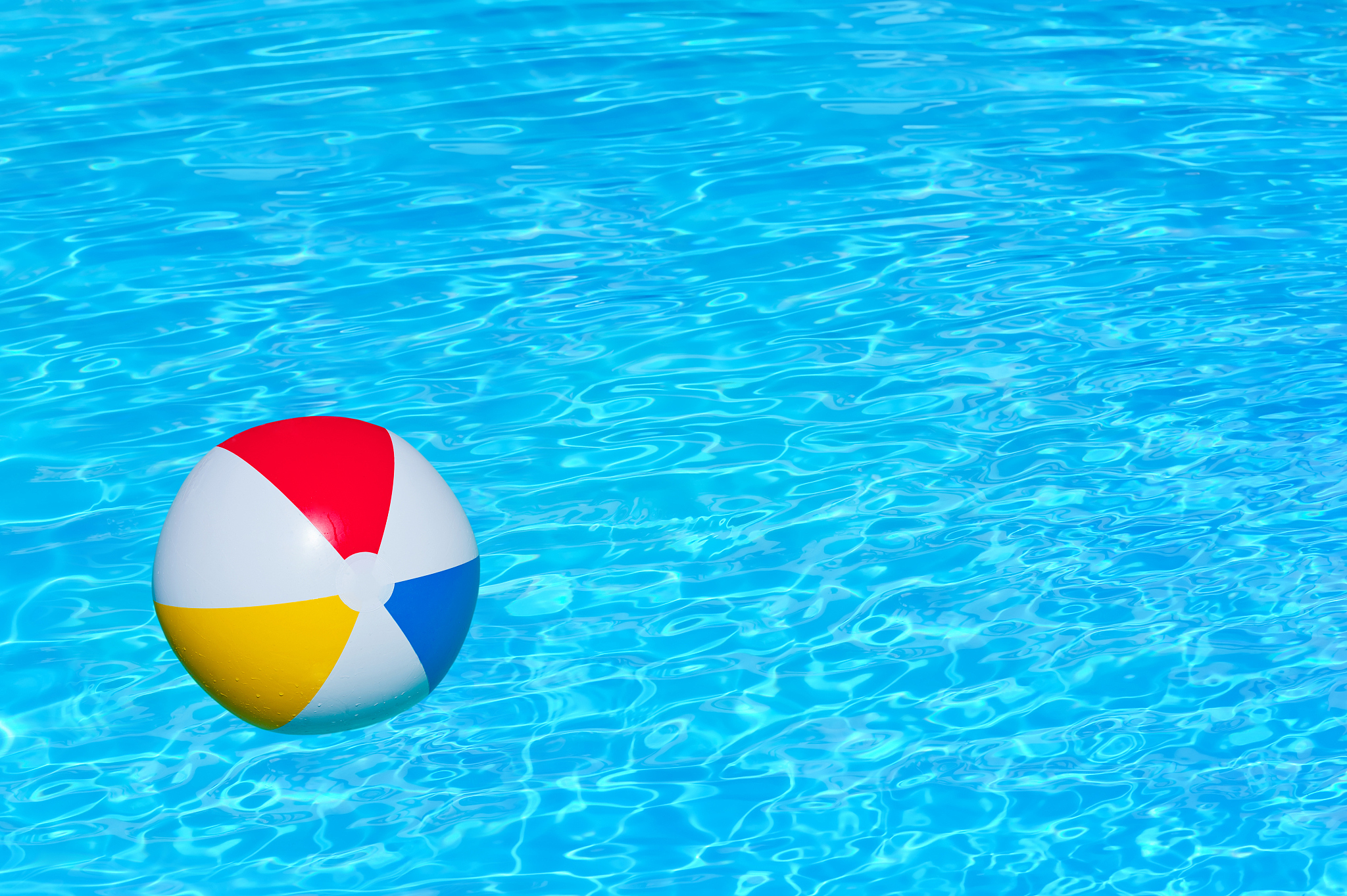 inflatable ball in swimming pool