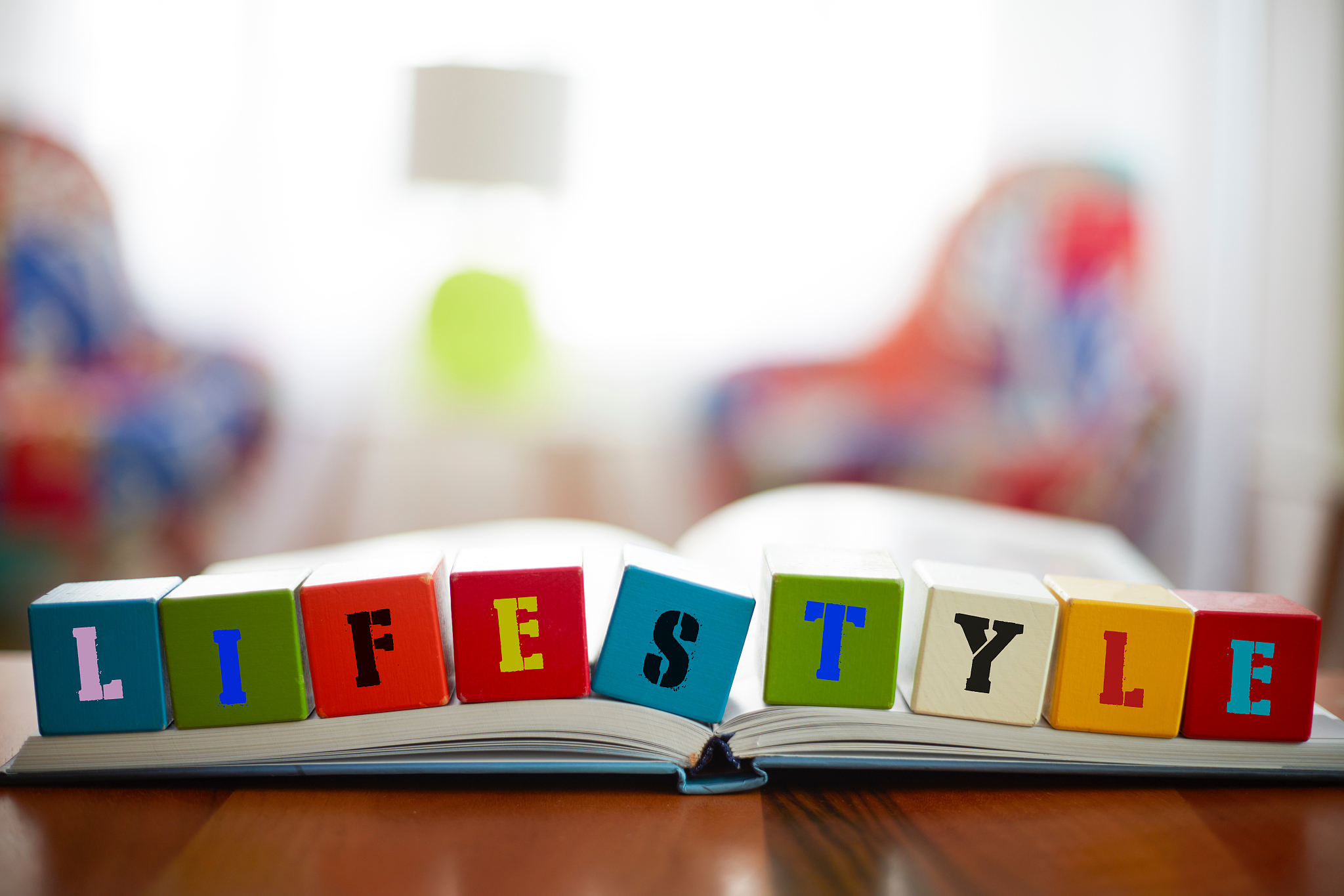 life style concept with building blocks on book