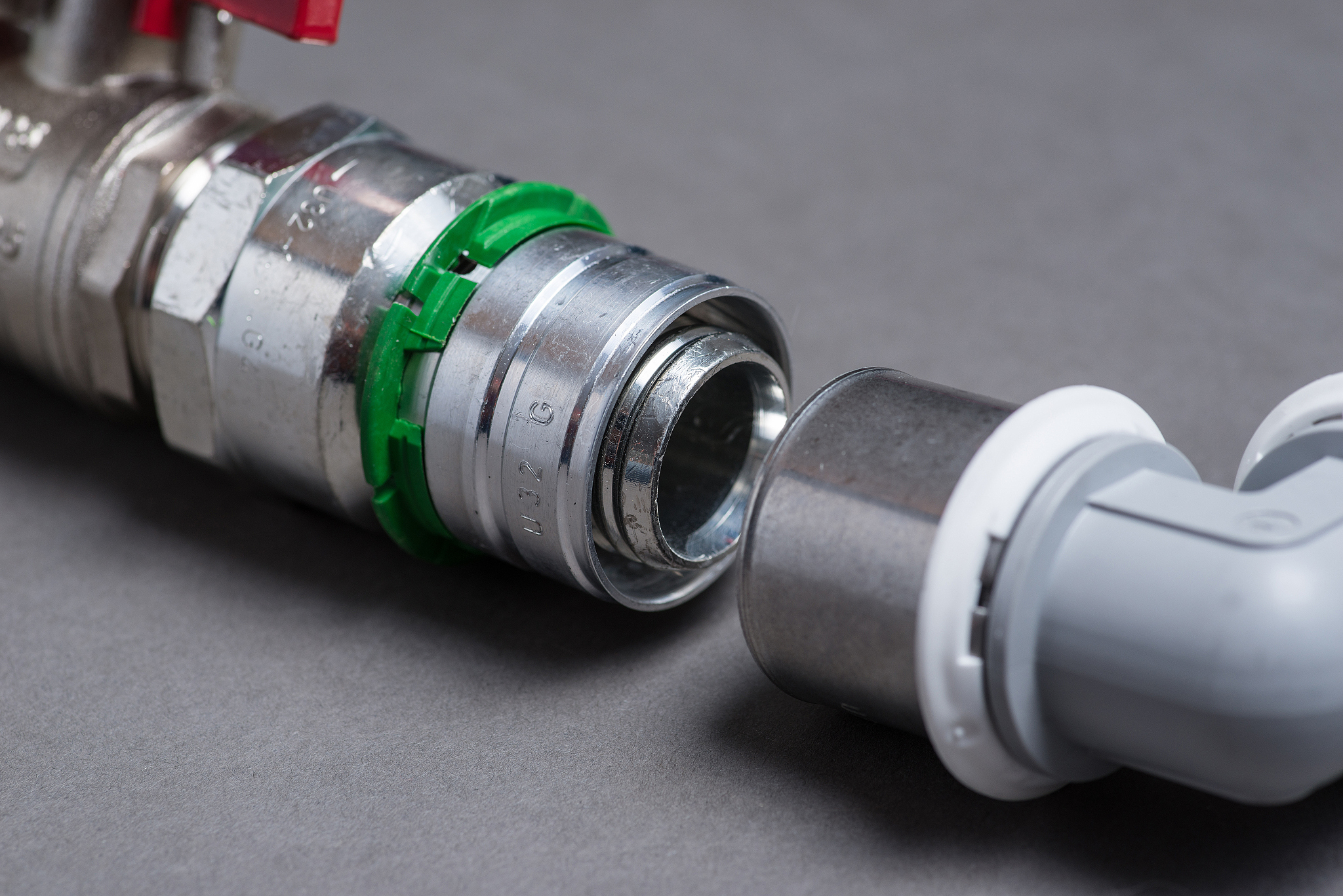 water valves with fittings on grey