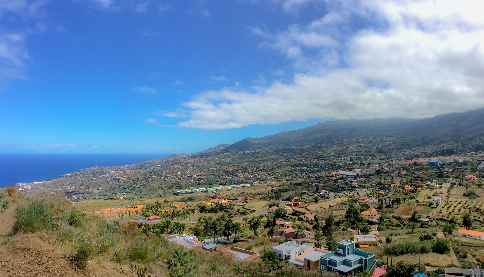 aerial view of townscape against sky