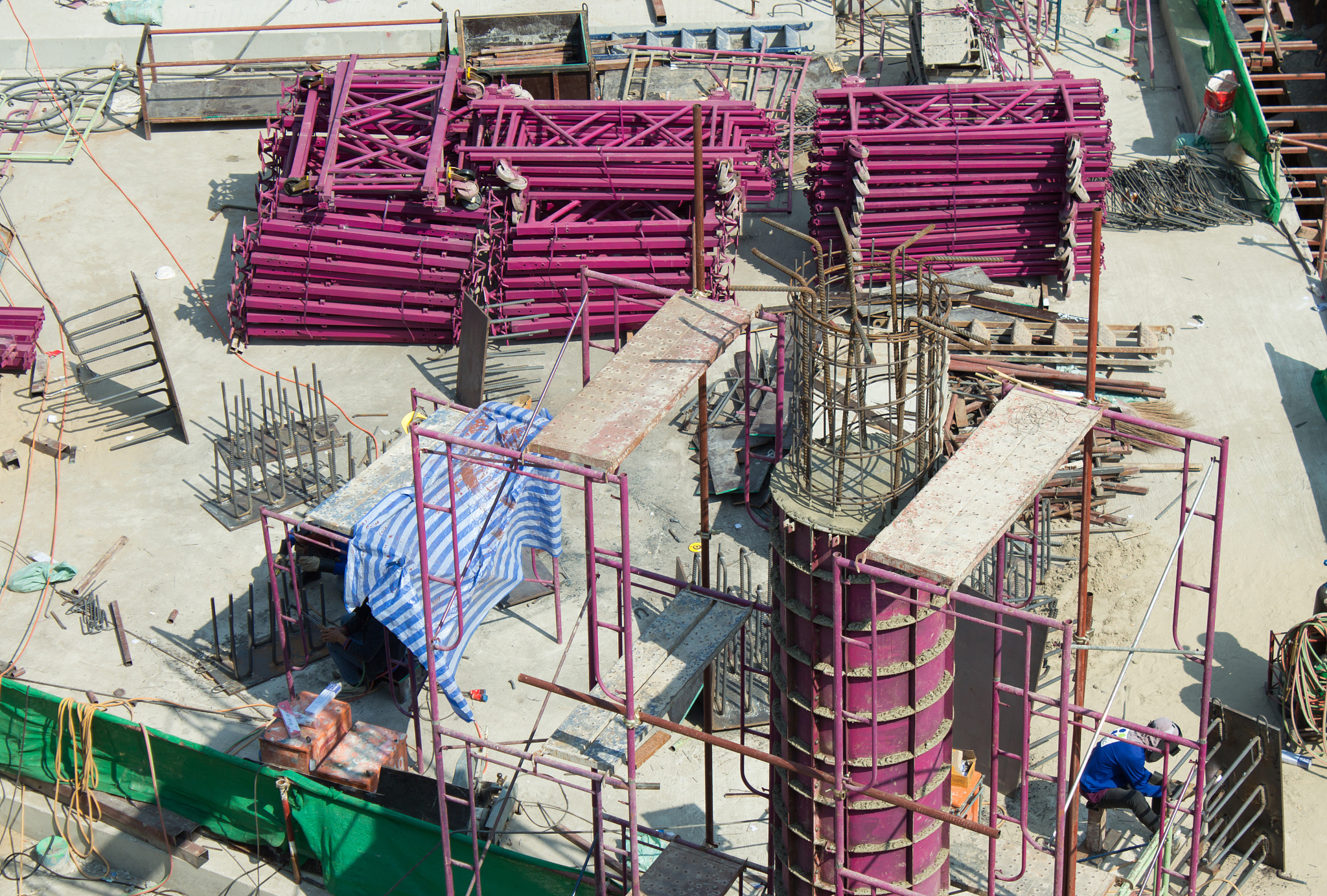 construction site, workers work structure with cement  steel and