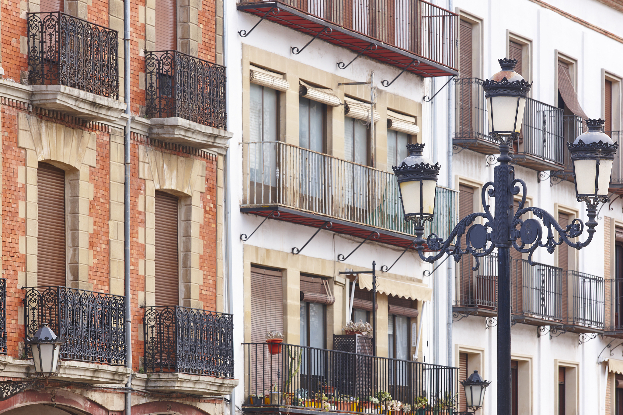 traditional andalusian village facades and lamp in baeza. spain