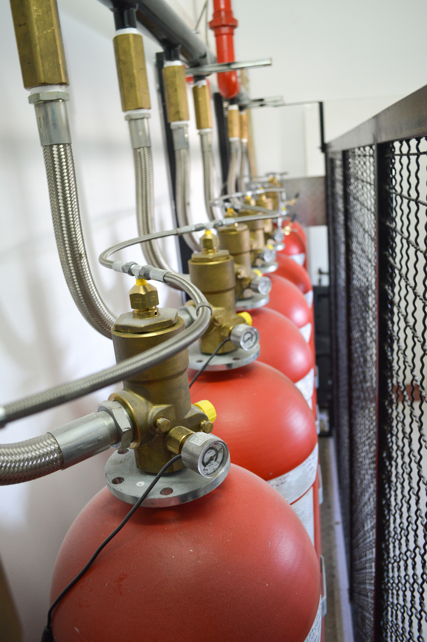 Please rephrase the following sentence for clarity according to the style of SCI journalsUnder the high temperature of fire the moisture in the concrete will be heated into water vapor which will caus