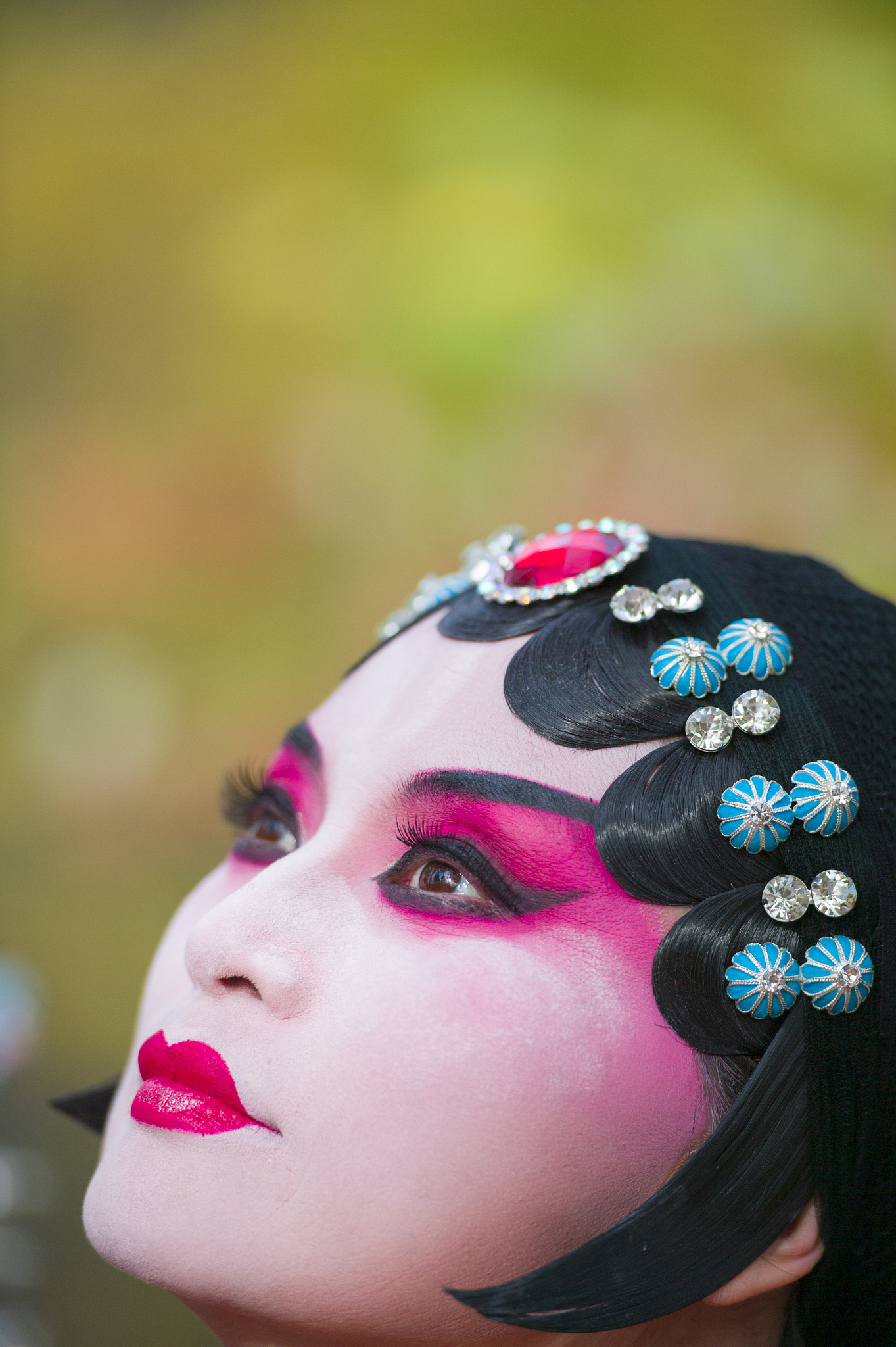 peking opera performer in the fall outdoor park, toronto, canada