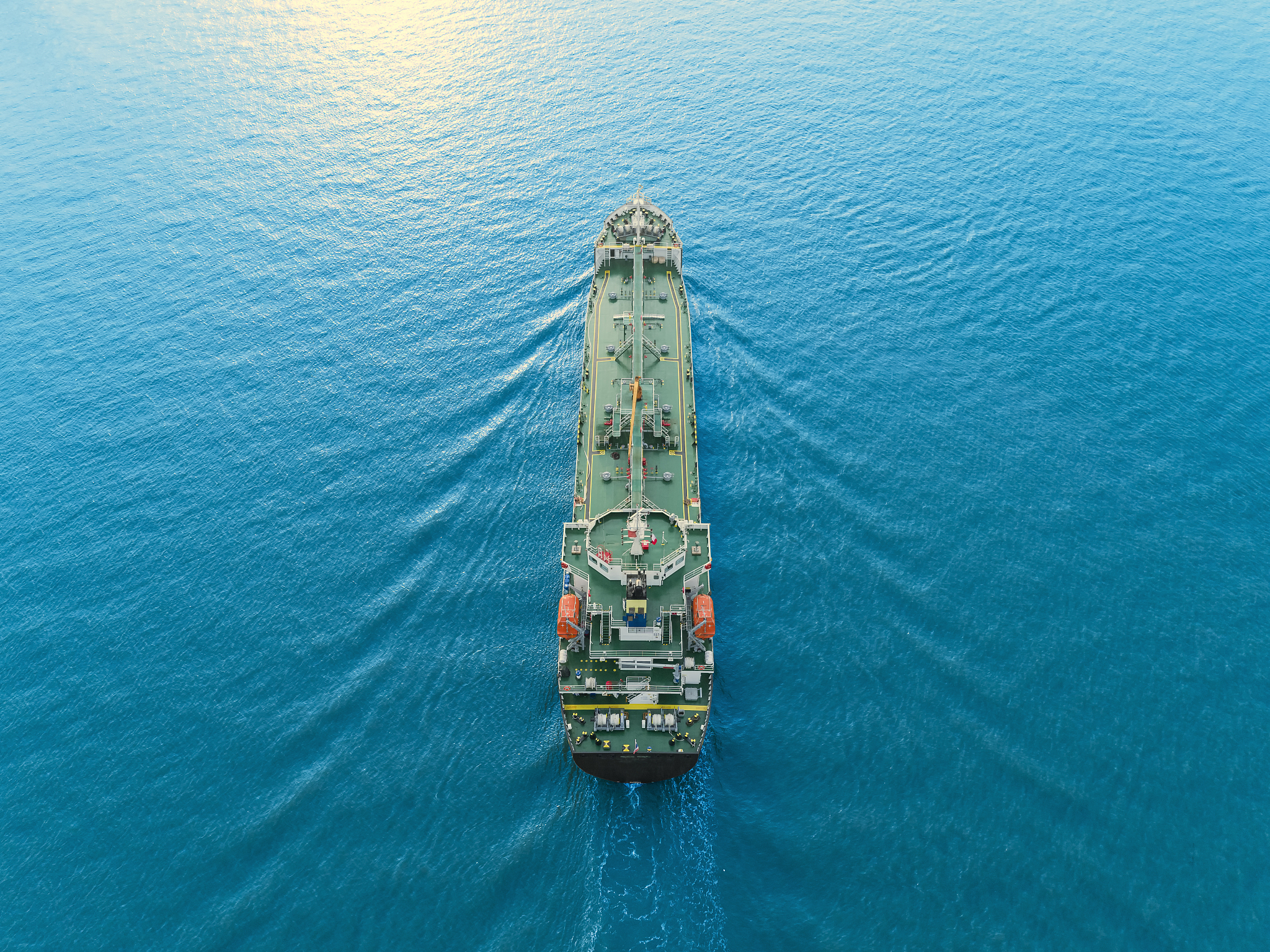 aerial top view oil ship tanker going to loading dock for load/u