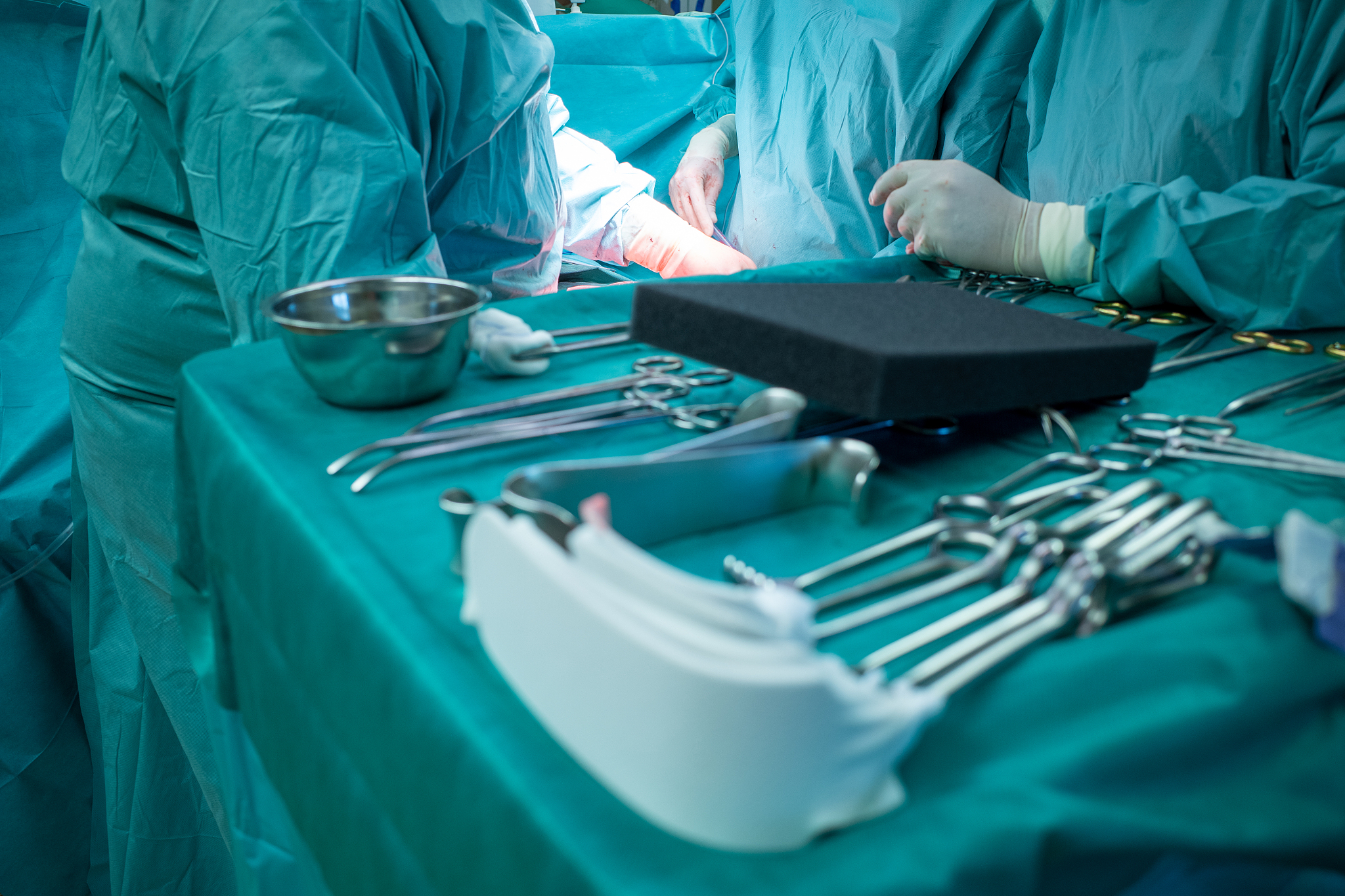 some sterile surgical instruments are on a table during an opera