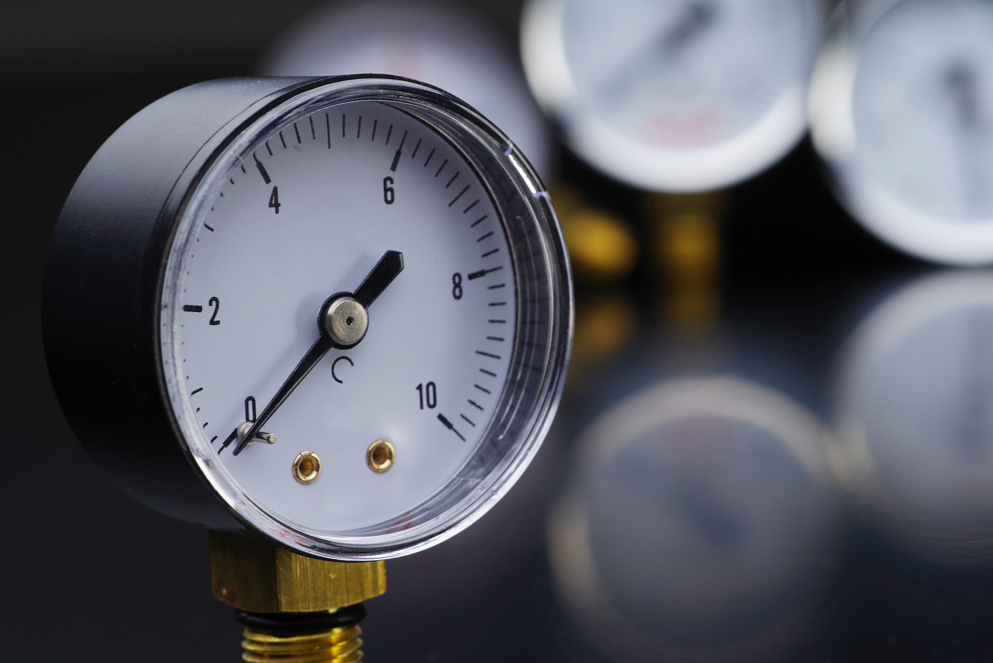 manometer in focus. a pressure gauge on the background of other 