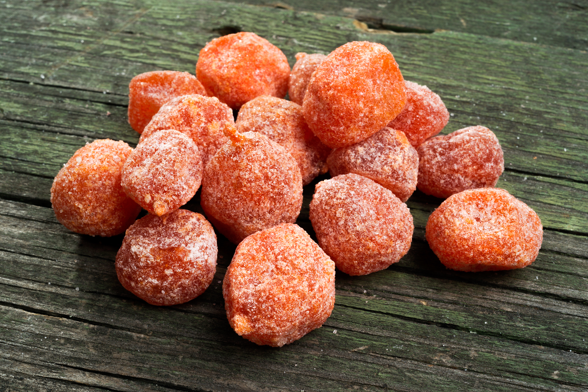 dried fruits, kumquat on wooden background