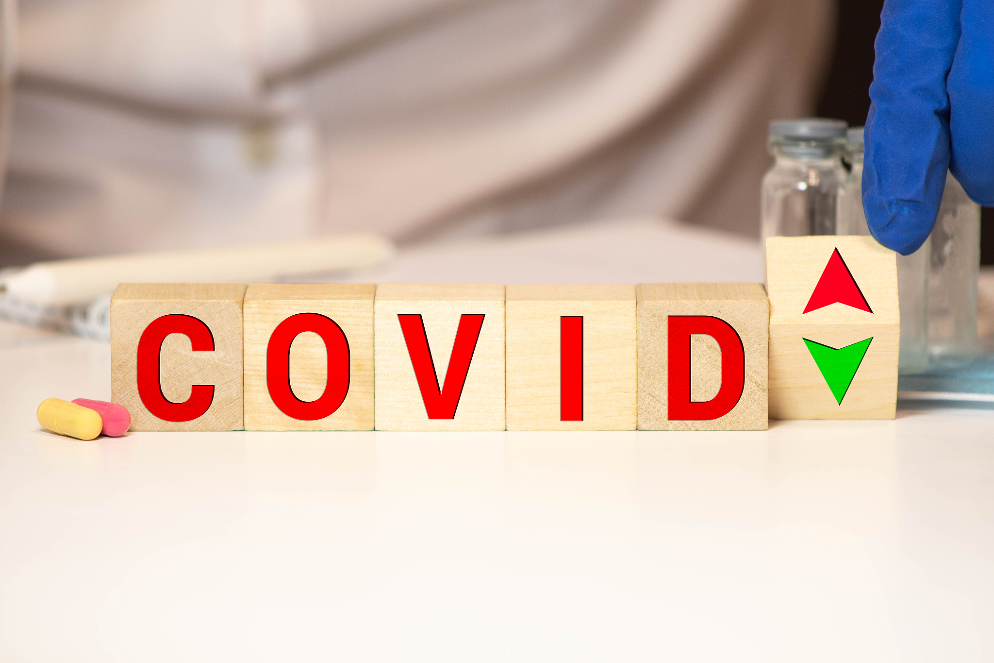 covid - 19 word on wooden block - corona virus concept.