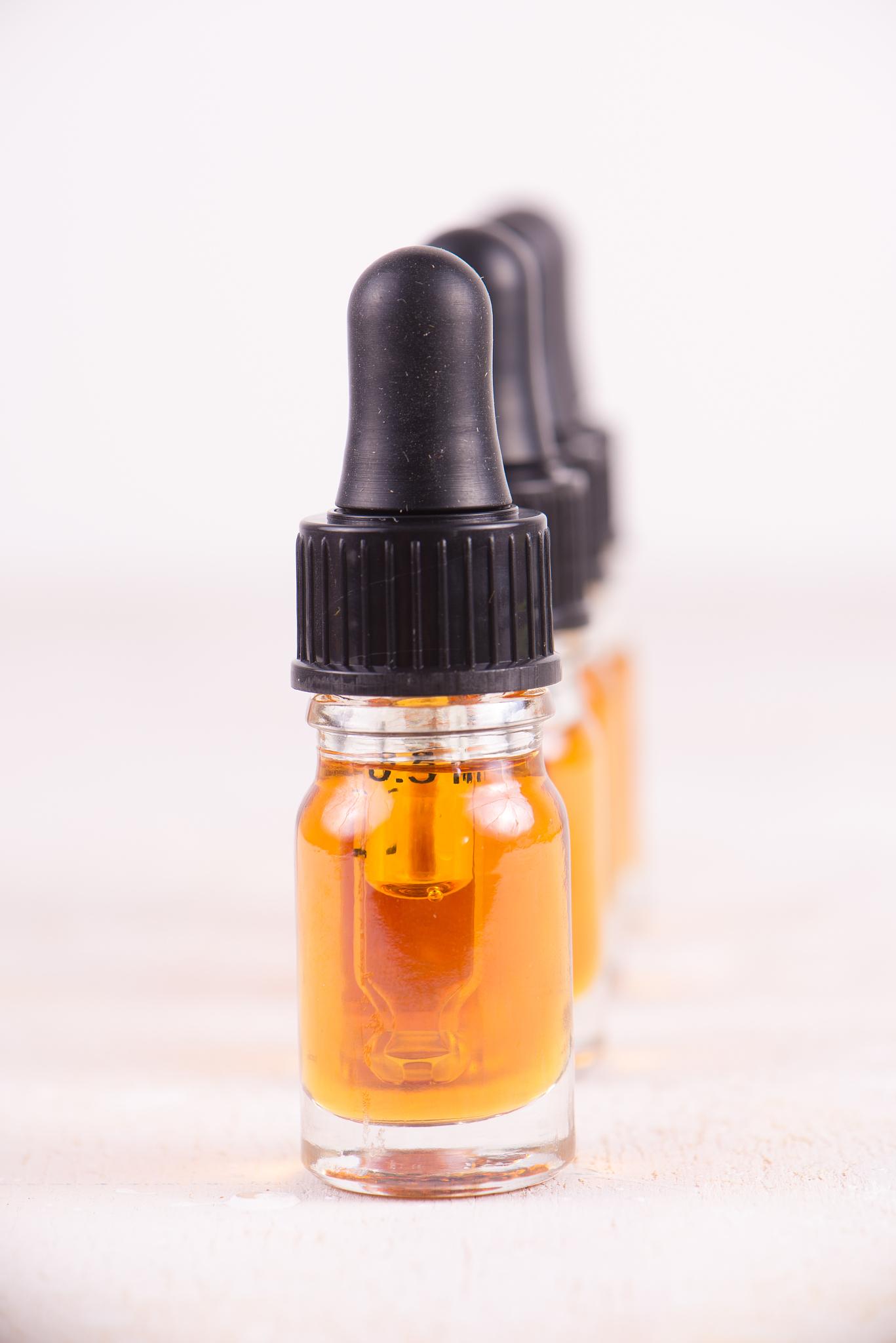 vials of cbd oil, cannabis live resin extraction isolated on whi