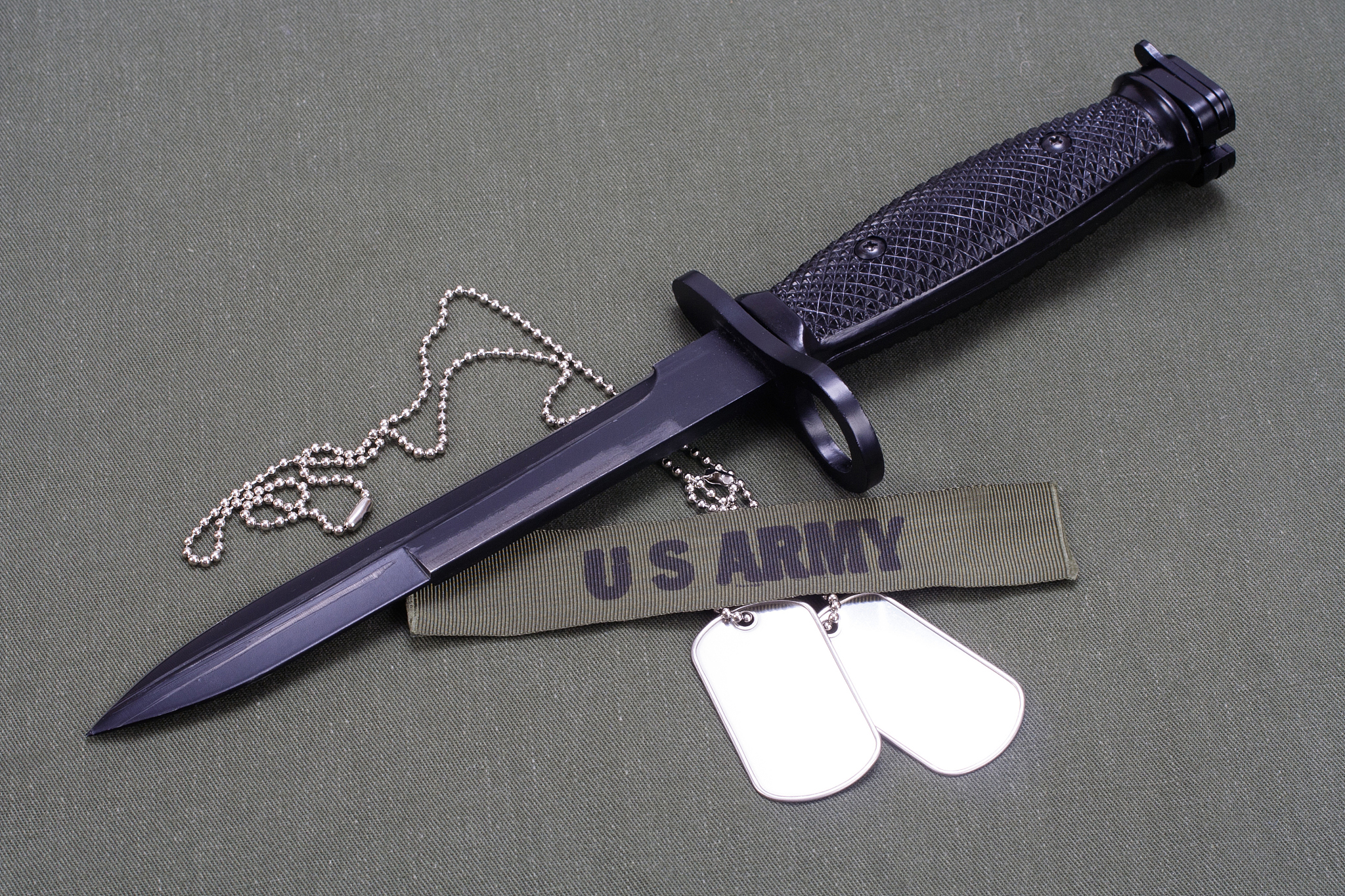 bayonet on us army uniform background