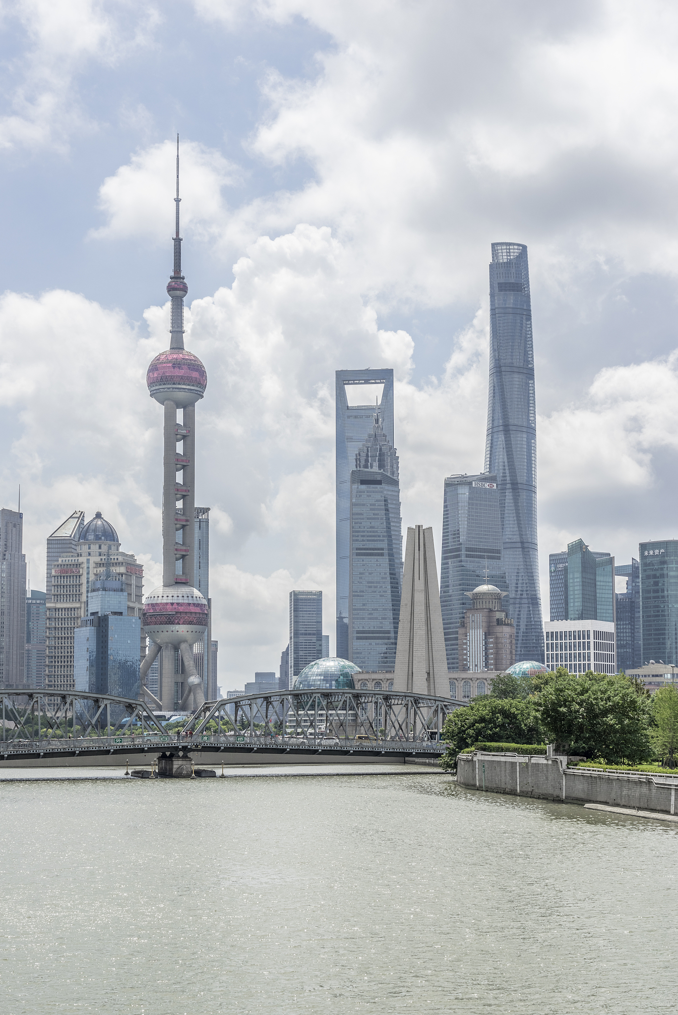 lujiazui financial district against cloud sky