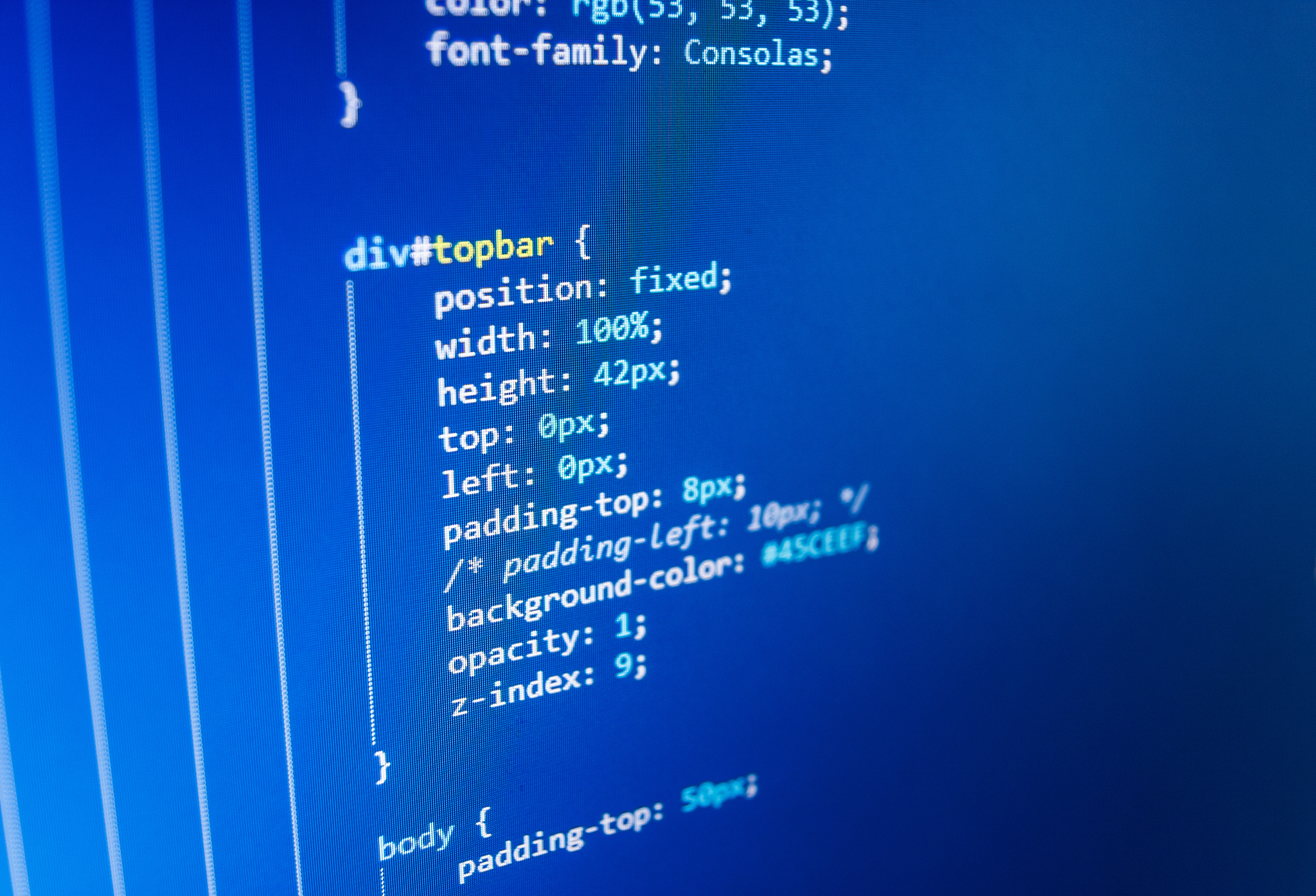 software developer programming code on computer