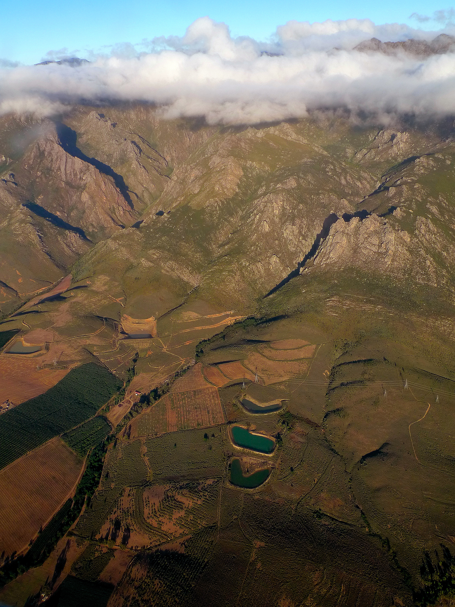 farmlands, dams, mountains, clouds ...