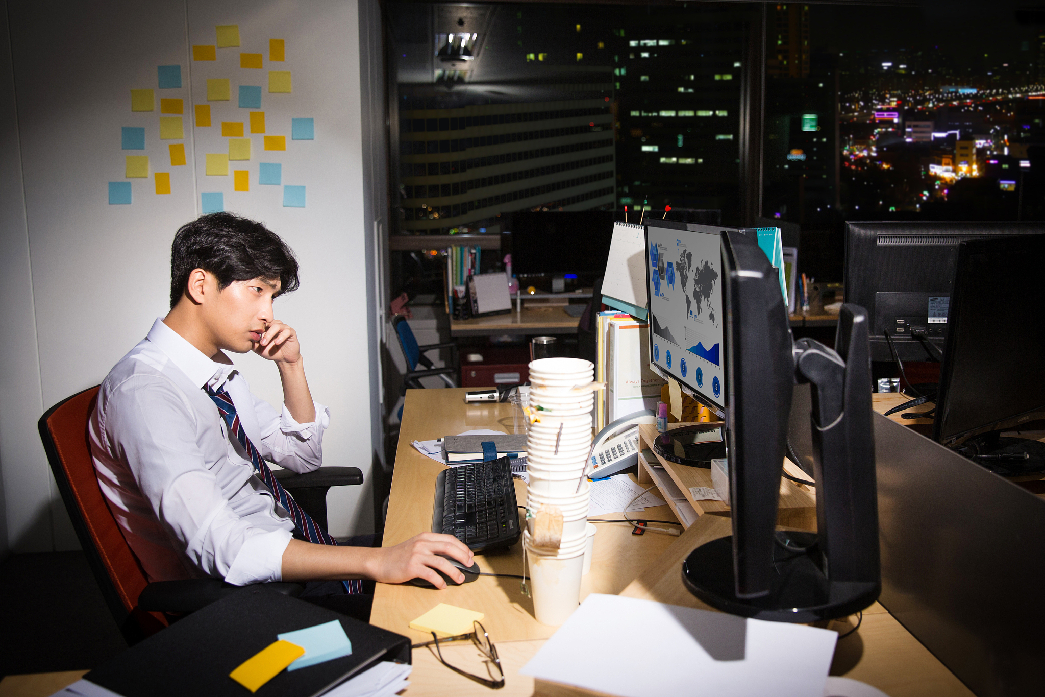 a businessman sleeping at a company