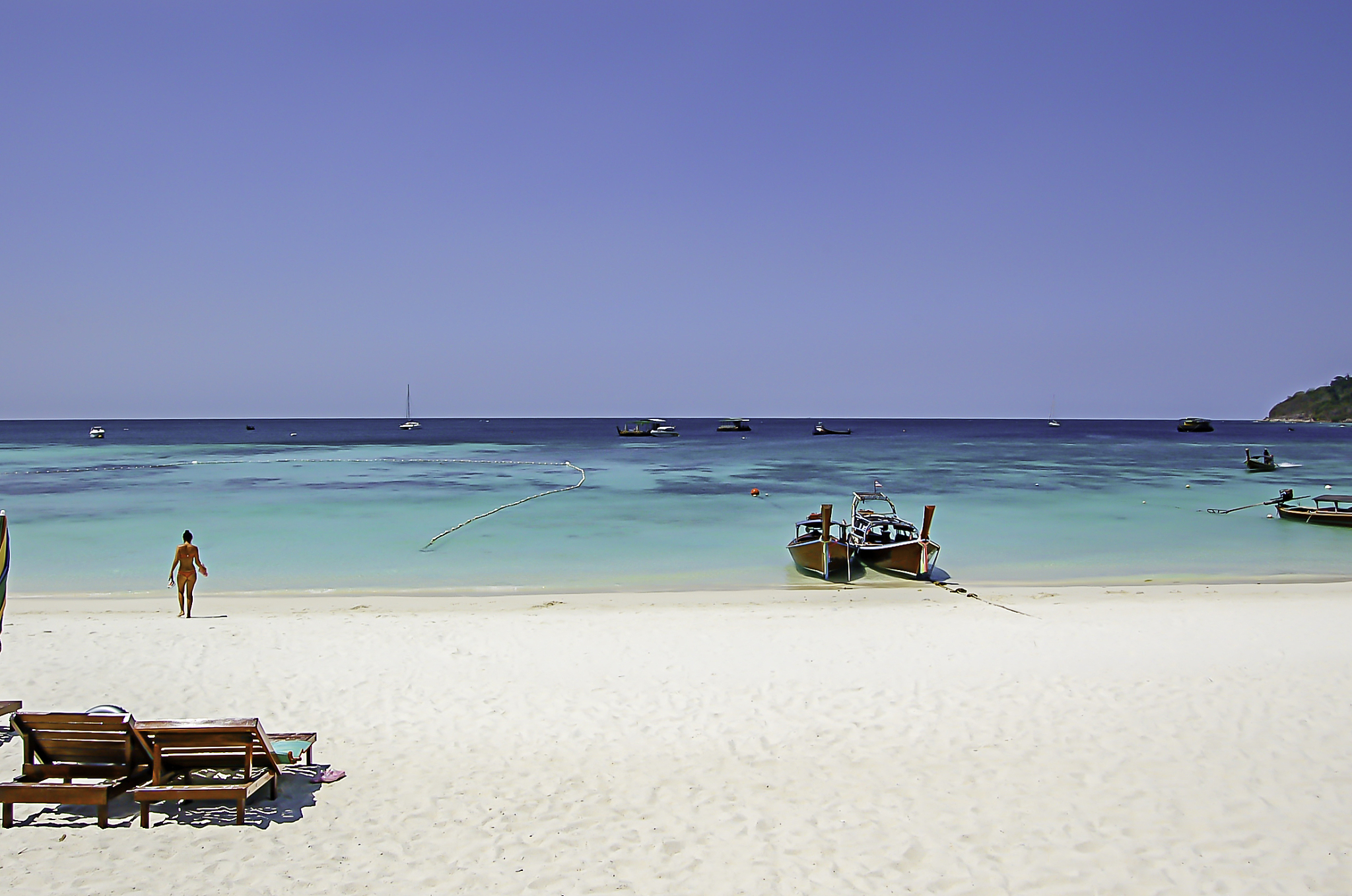 the beauty of the summer sea and the ship on the beach , koh lip