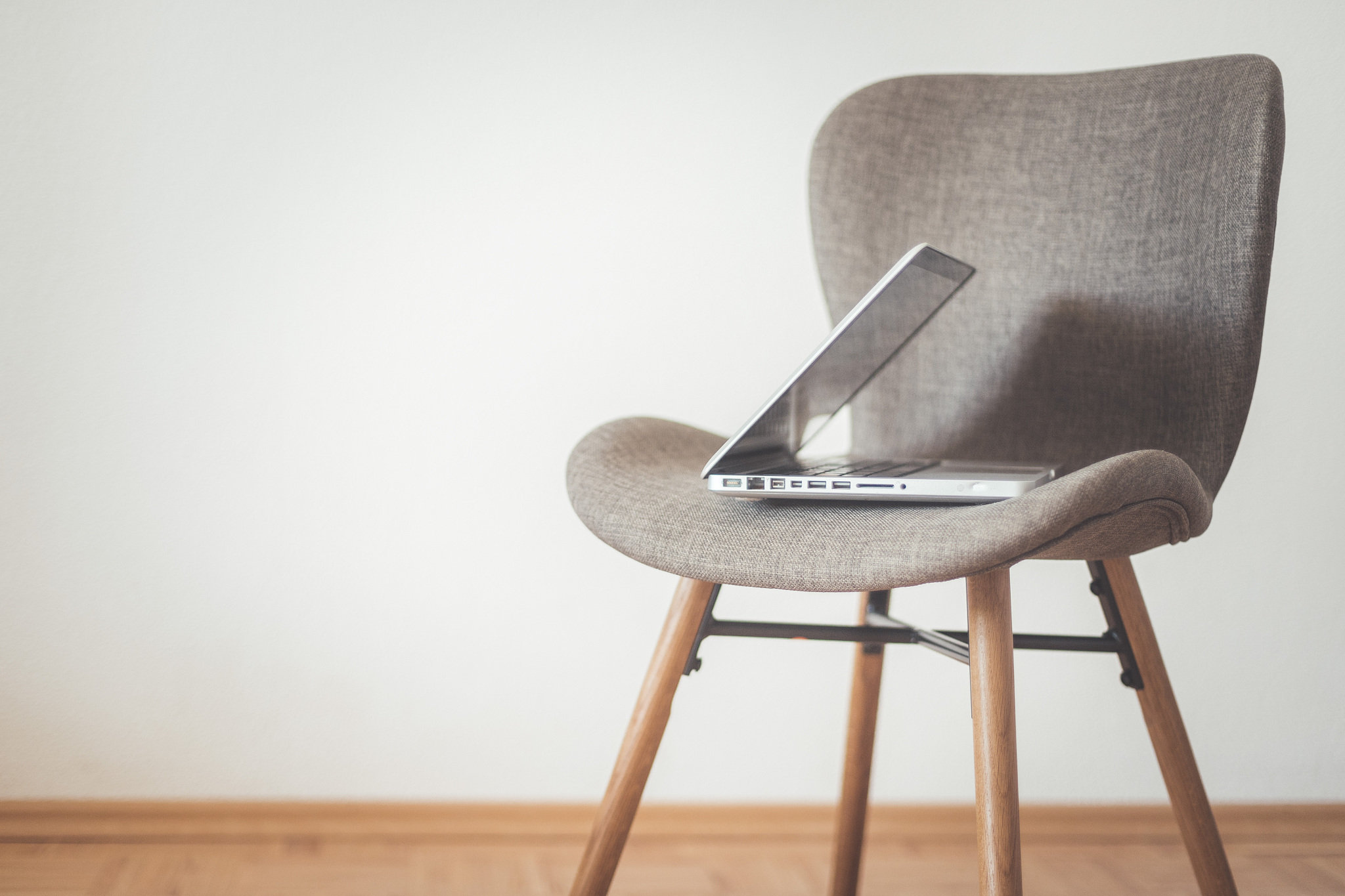 leisure home office concept. laptop on vintage chair.