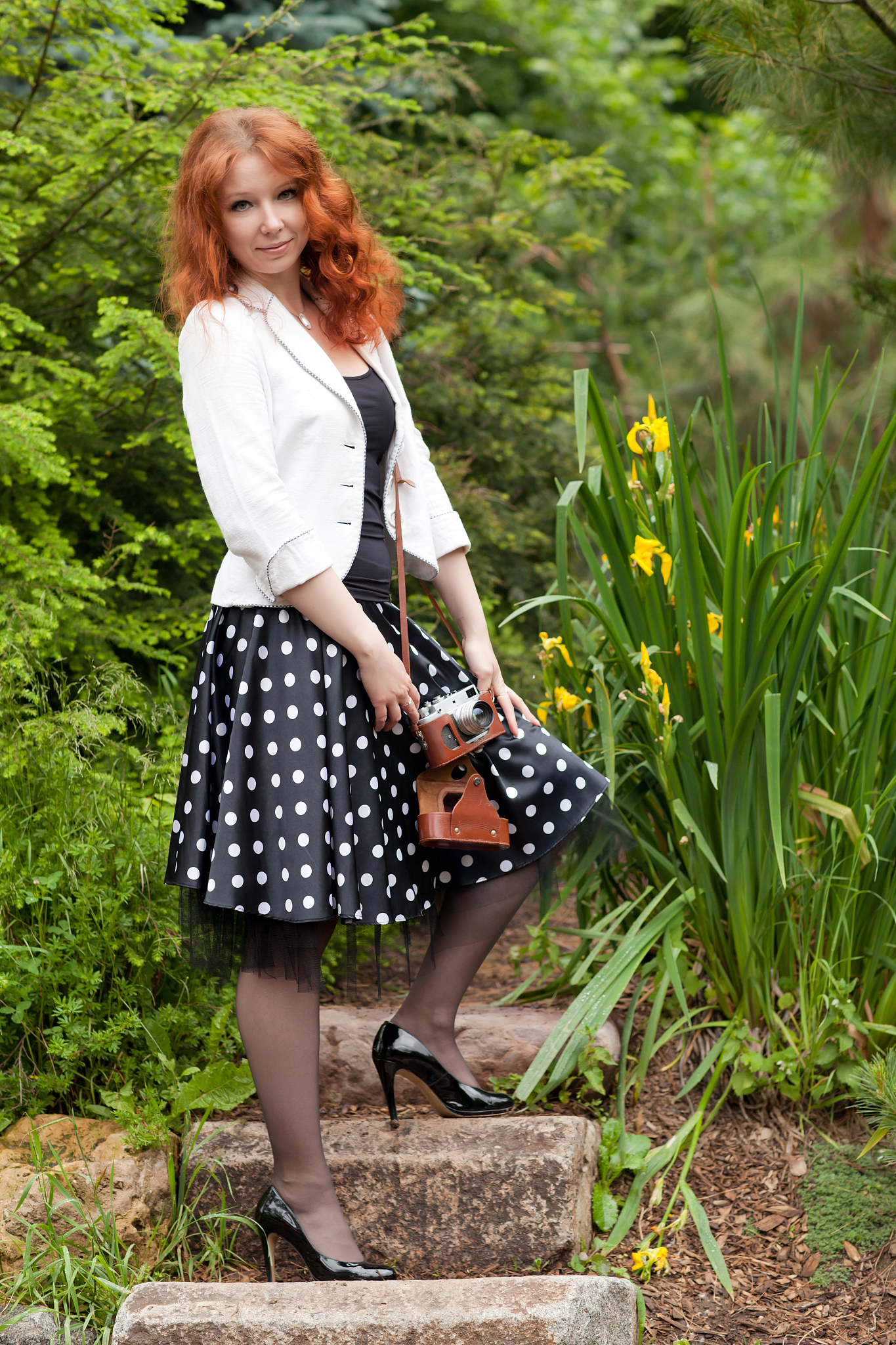 woman with an old vintage camera