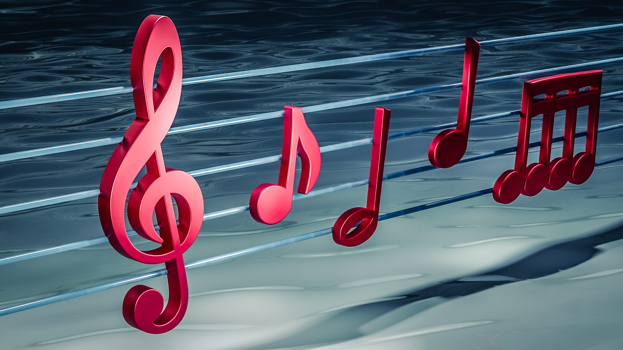 close up of red music notes with an aquatic blue background.