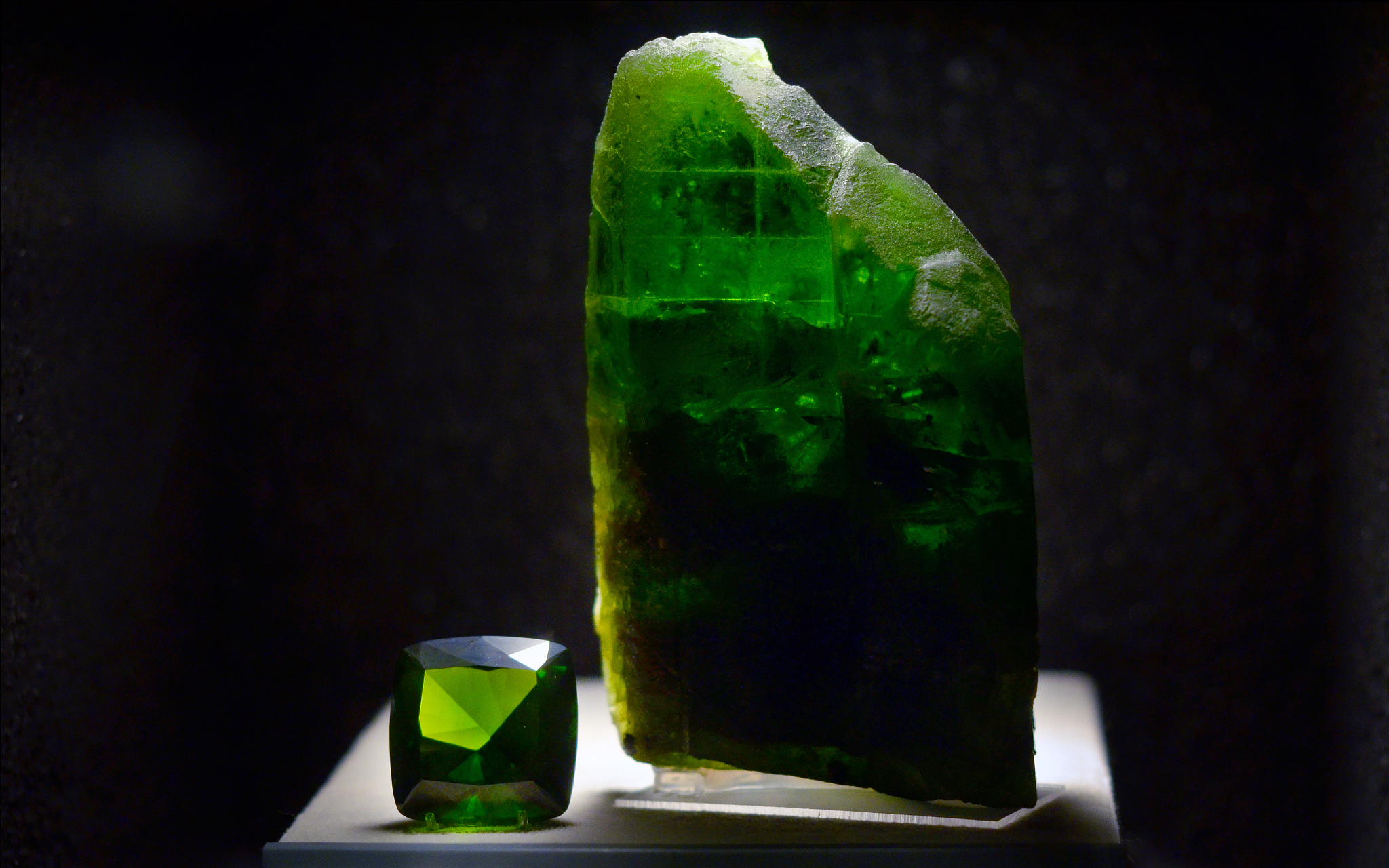 close-up of emerald gemstone on table