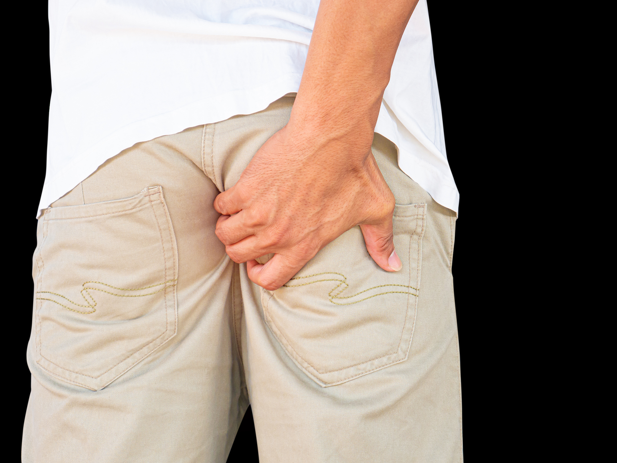 young man has itching in the anus, anal disorders.  isolated on 