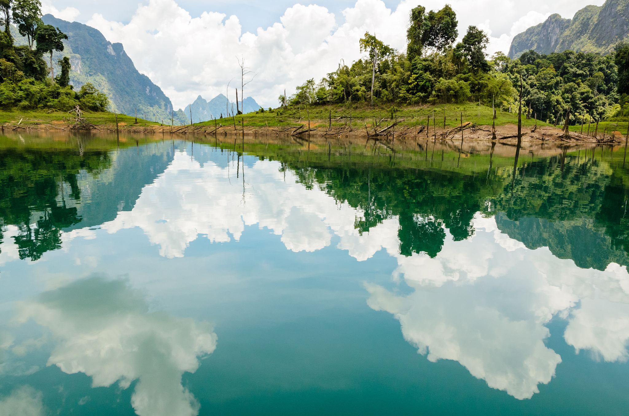 water surface reflecting sky and cloud