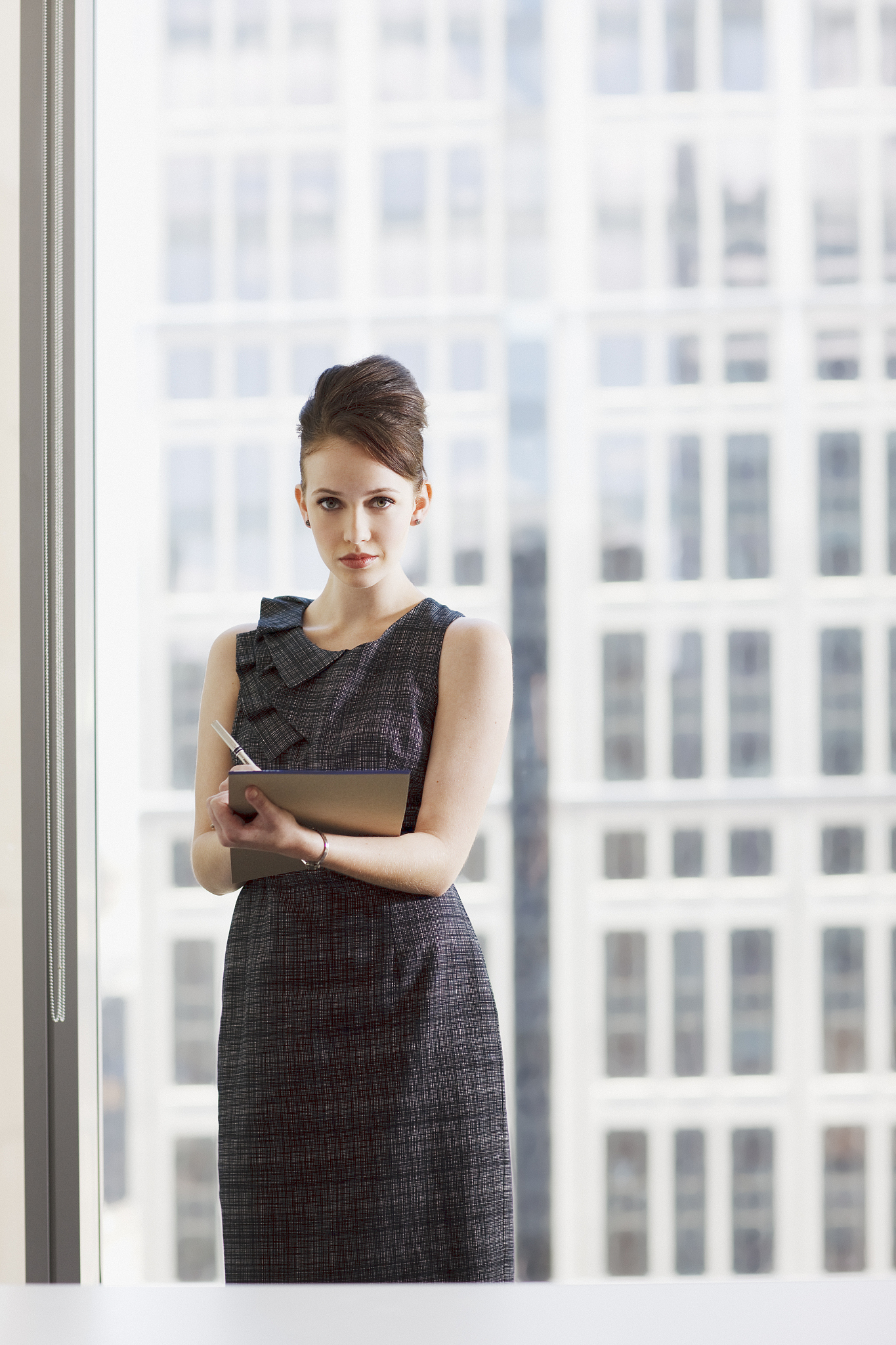 businesswoman writing in office