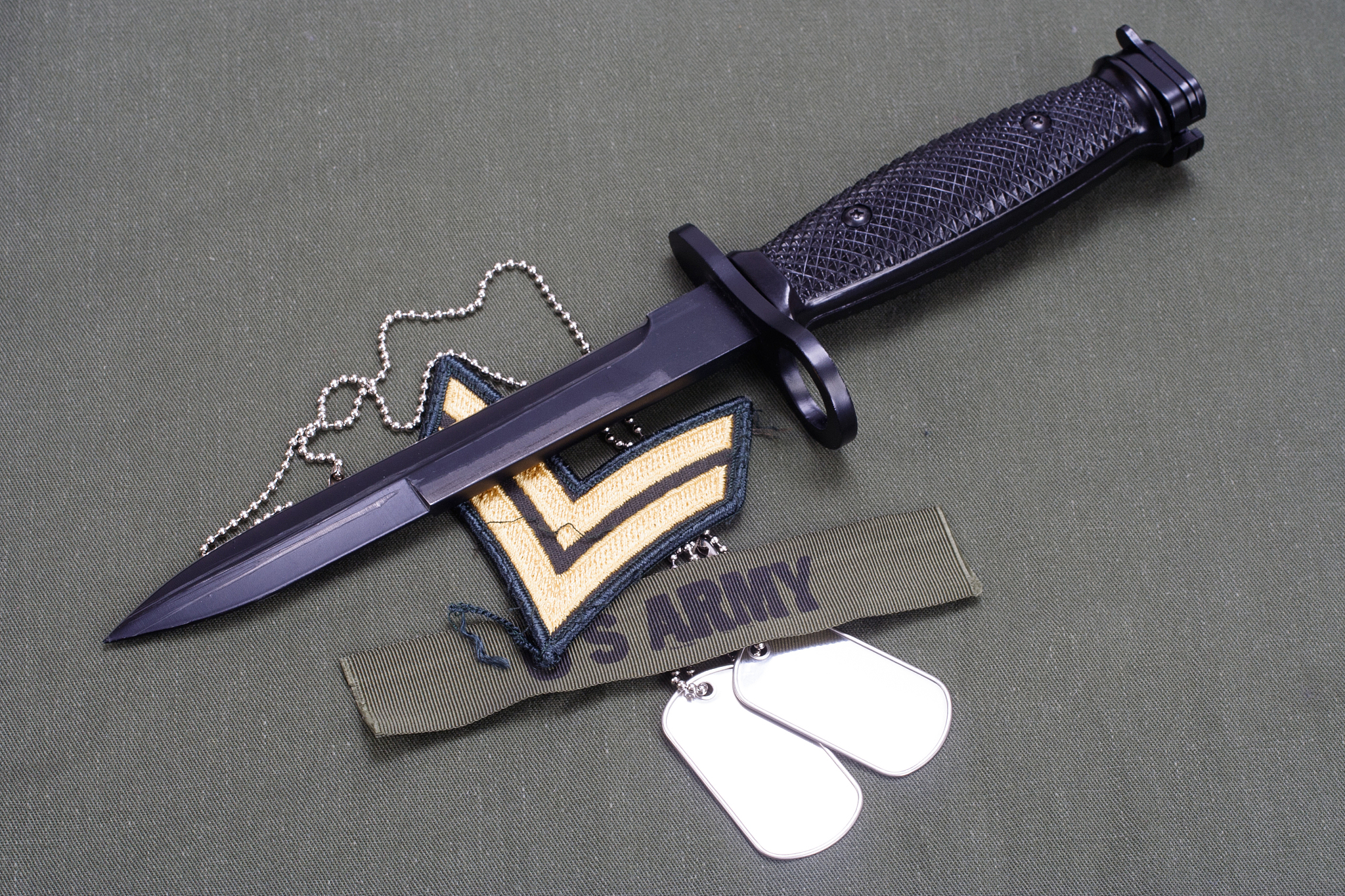 bayonet and dog tags on us army uniform