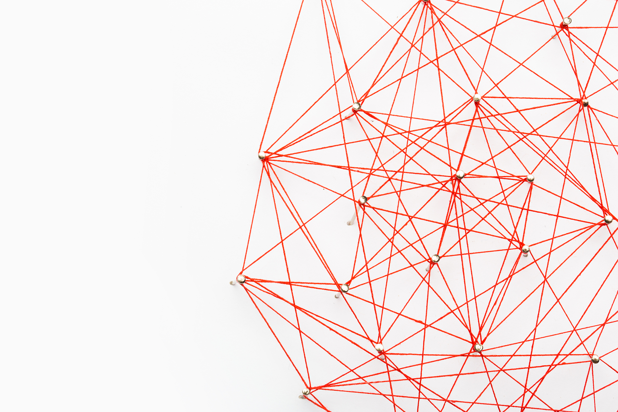 a large grid of pins connected with string. communication, netwo