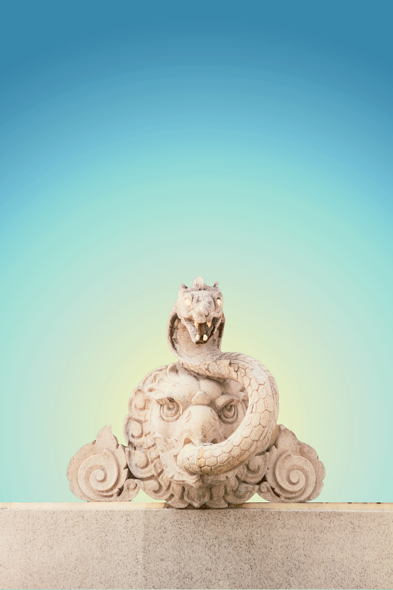 sculture of head lion and snake tongue