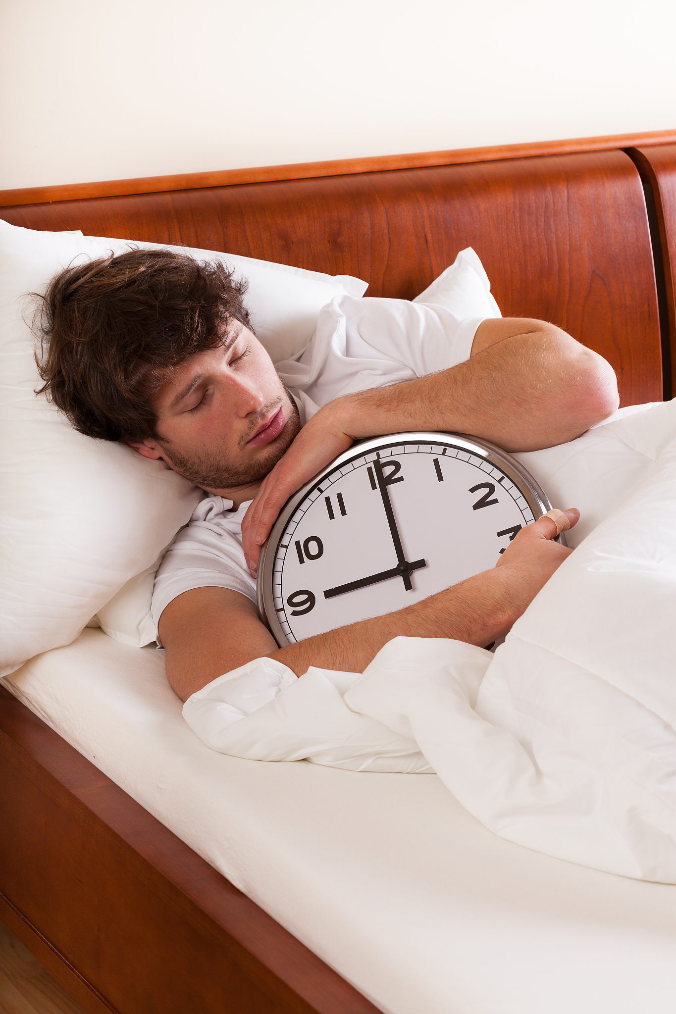 asleep man with clock