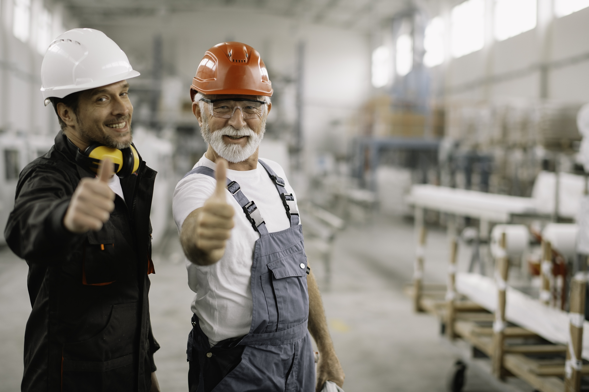 colleagues showing thumbs up.