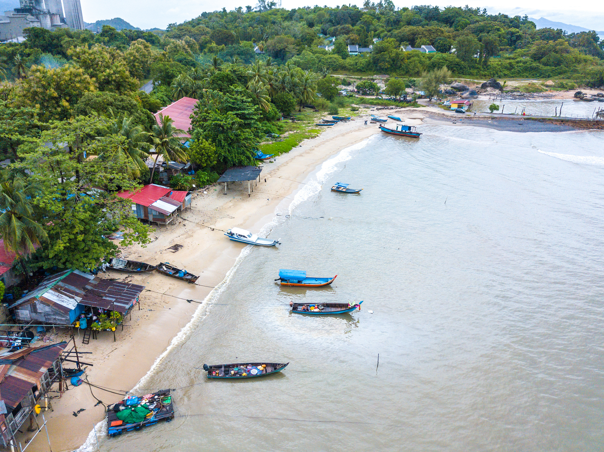 high angle view of boats moored on sea at beach