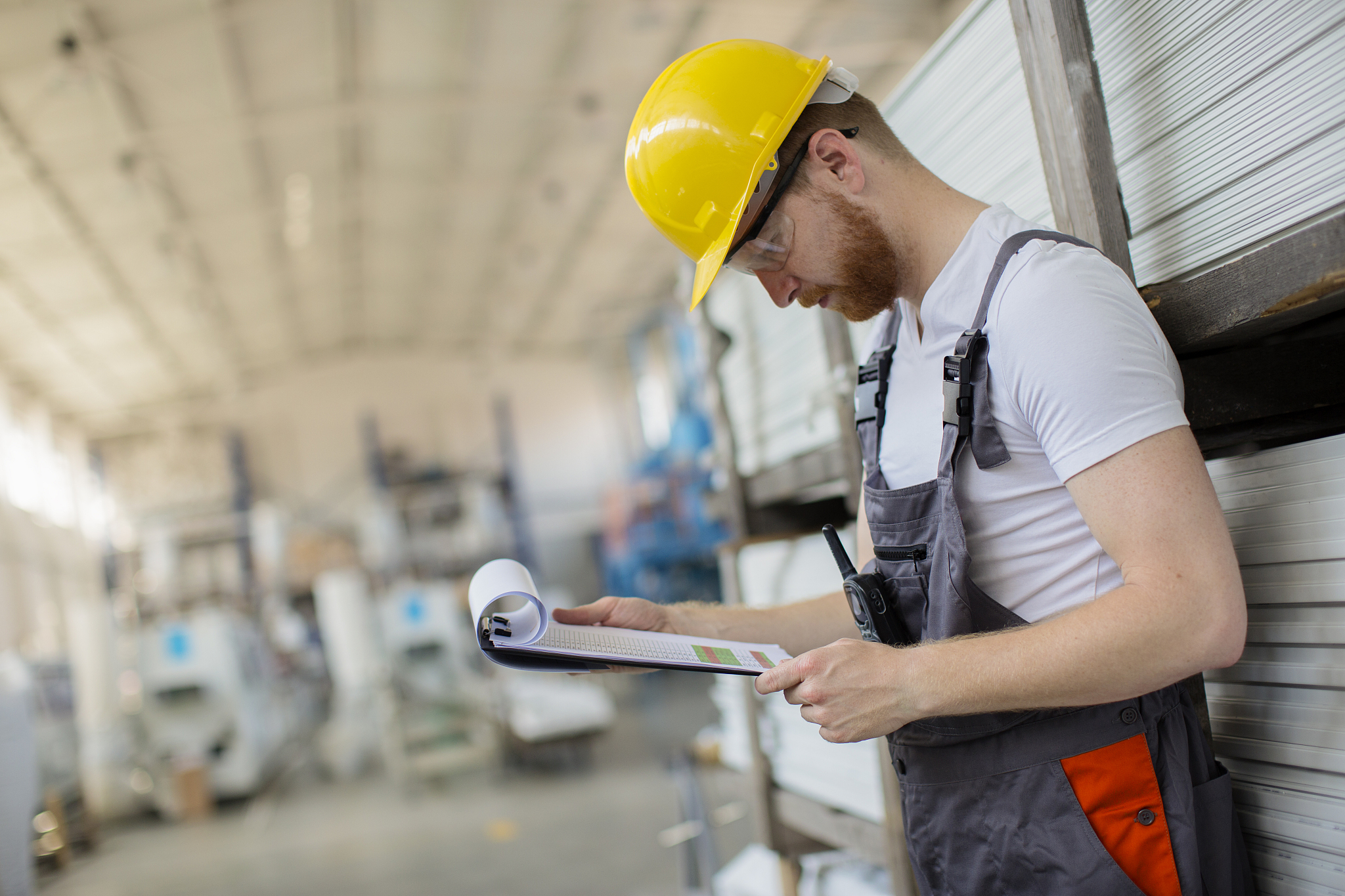 factory worker checking shedule