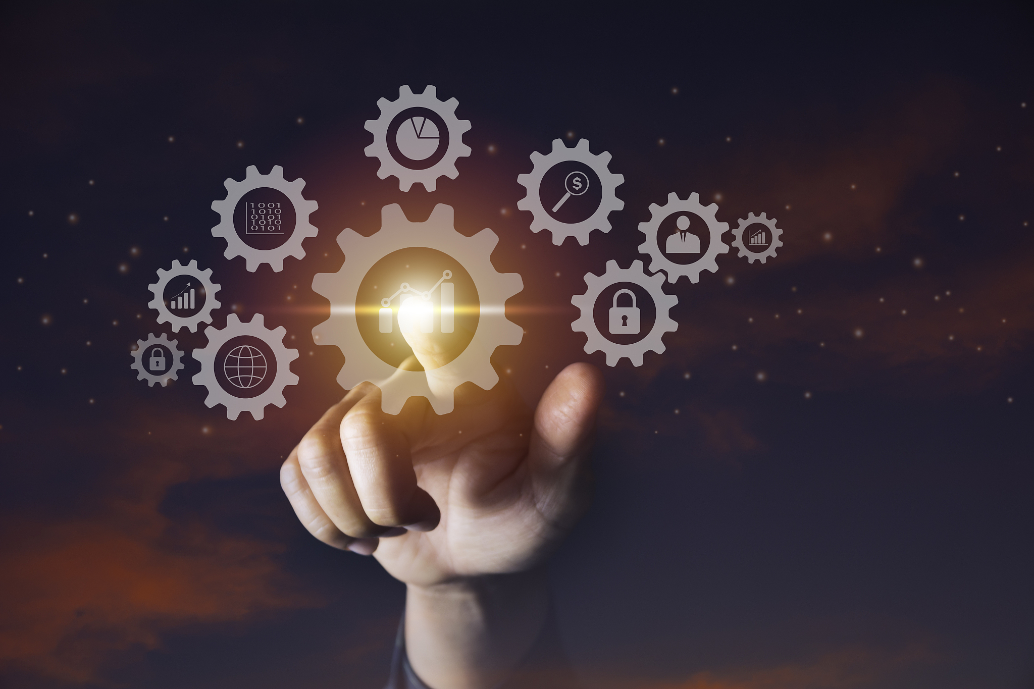hand of businessman holding gear icon for technology and busines