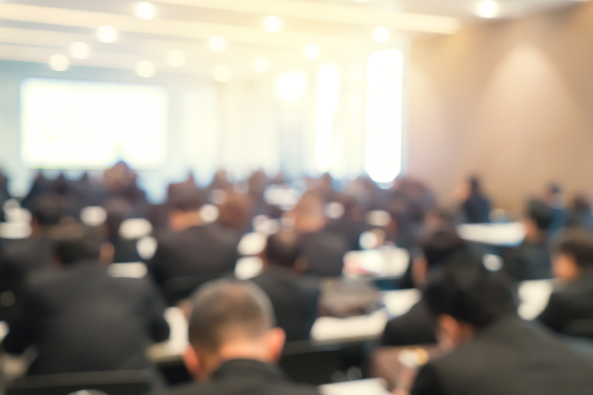 blur of business conference and presentation in the conference h