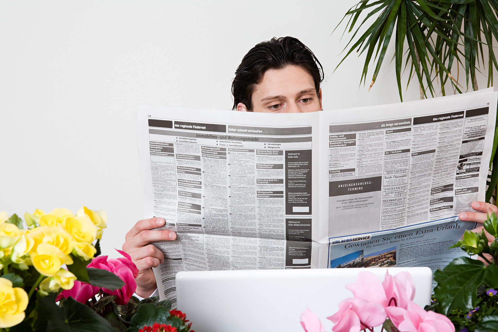 man reading newspaper
