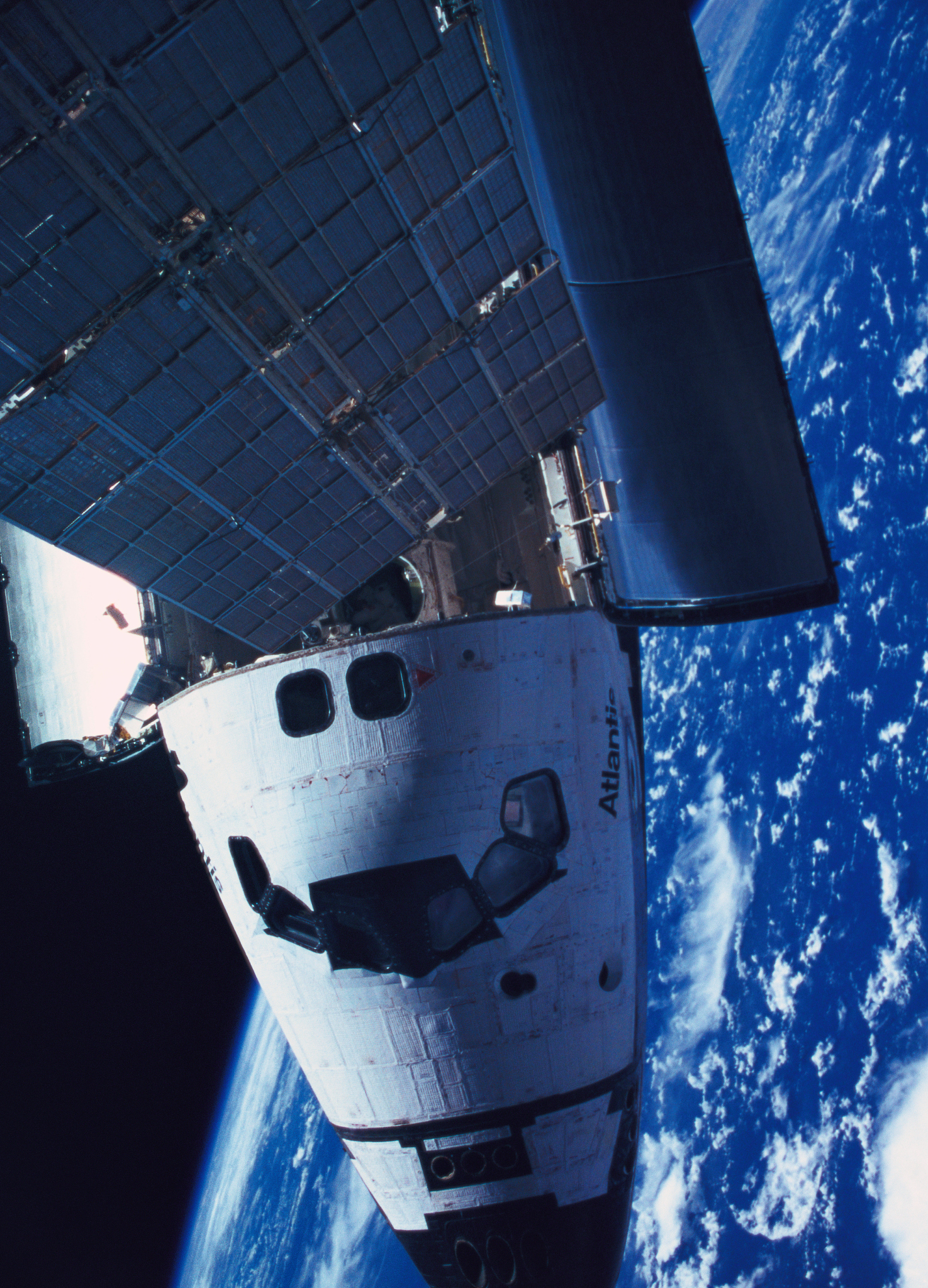 the space shuttle docked with a space station