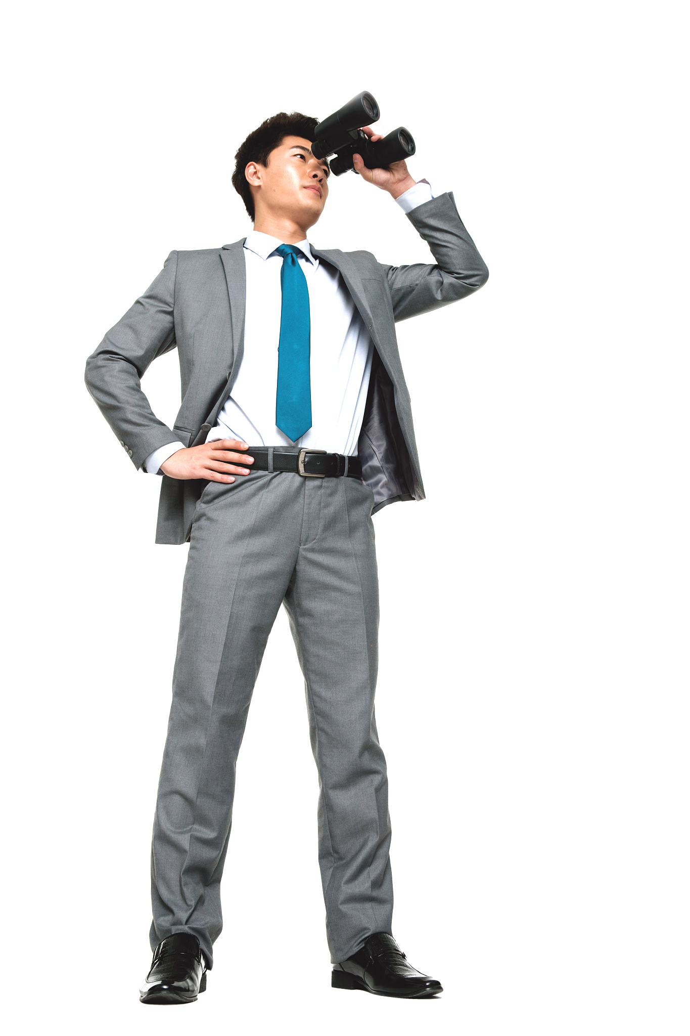 商务青年男人拿着望远镜