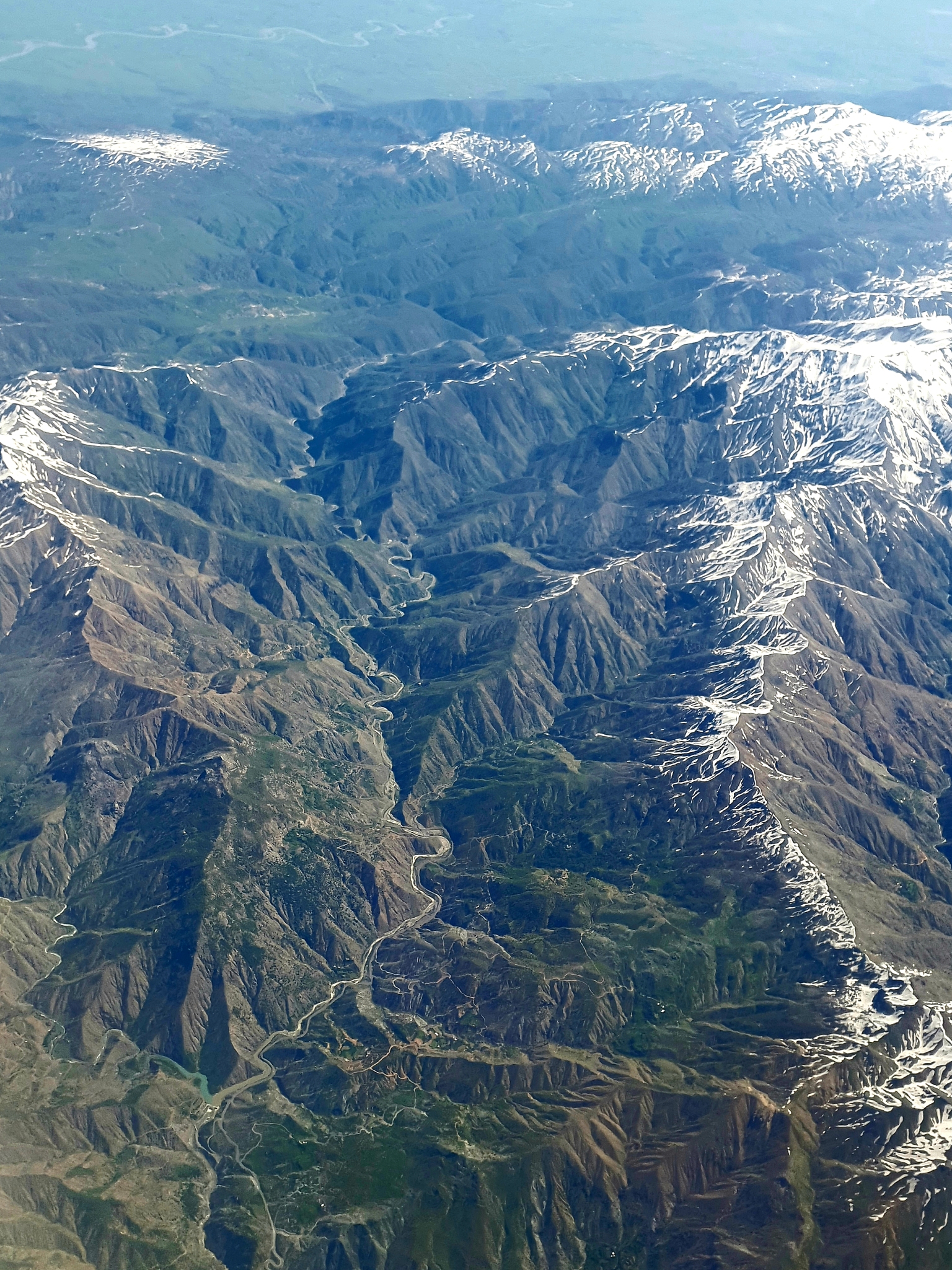 topographic view of snow covered mountain ridges