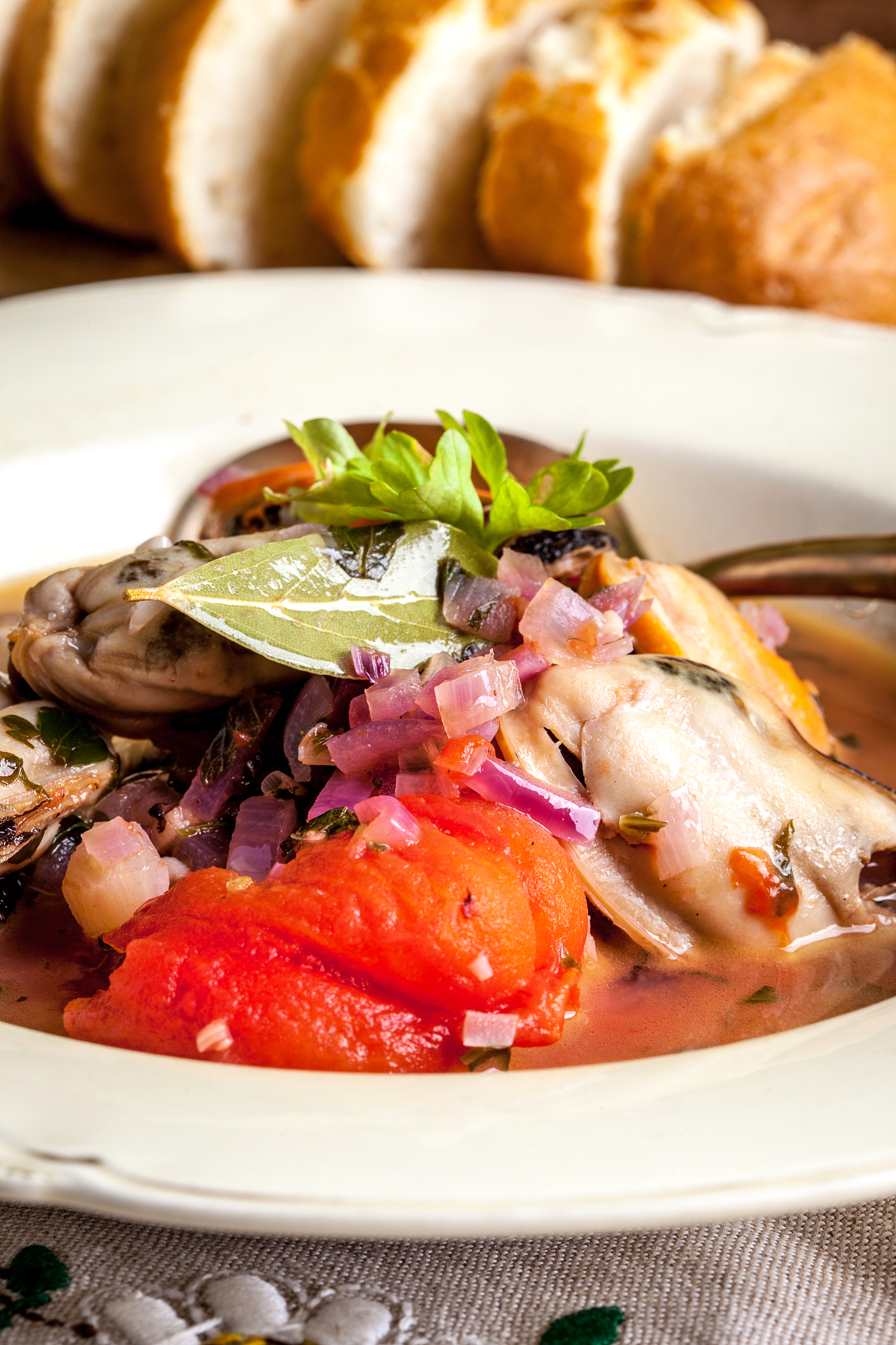 cooked mussels in tomato sauce.