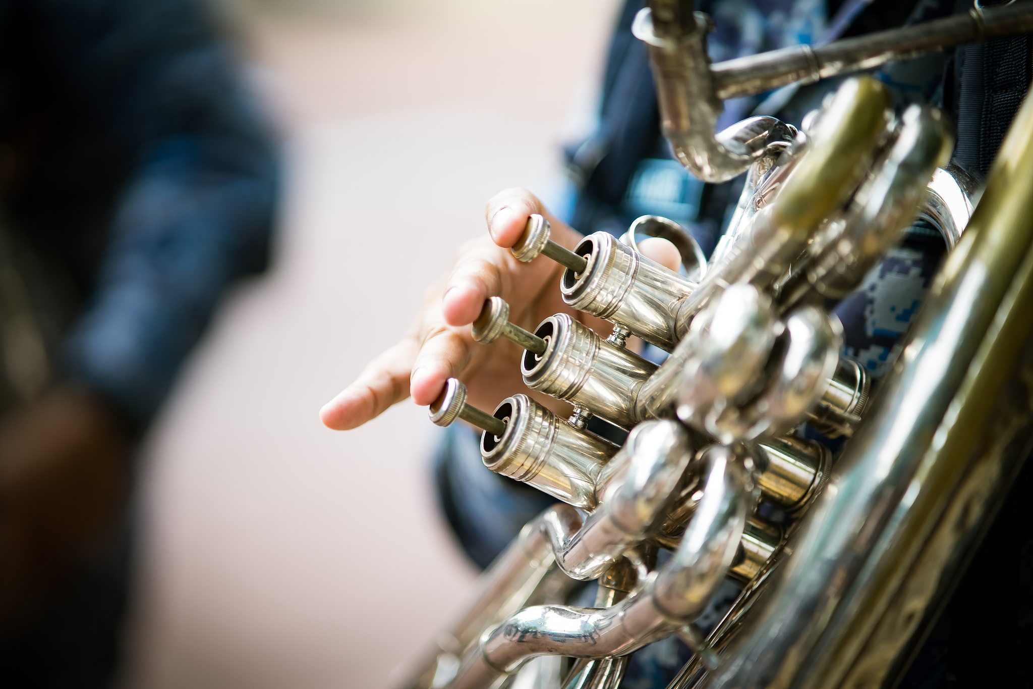 close-up of musician playing horn